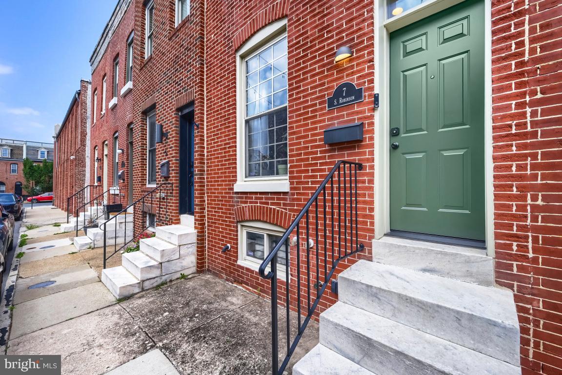 Move right into this beautifully maintained, thoughtfully updated home, located just a couple of blocks from Patterson Park. The open-concept main level has hardwood floors, exposed brick, and an inviting layout designed for today's lifestyle. The living area can easily accommodate a sectional sofa, while the 
dining/kitchen space provides plenty of room for everyday meals, or entertaining. A convenient powder room on the first floor adds extra functionality.
Upstairs, the lovely primary bedroom features a tray ceiling and exposed brick, creating a warm and comfortable retreat.  The second bedroom is the ideal guest room, or home office. The full bathroom includes a separate tub and walk-in tiled shower stall. 
The basement offers abundant storage space, while the exterior rear patio, enclosed by a newer wood privacy fence, is where family and friends will gather for grilling and relaxing.
Major updates provide peace of mind, including a new roof with warranty (2025), new HVAC (2025), new water heater (2024), and a new front door (2025).
Ideally located just minutes from both Johns Hopkins Hospital and the Hopkins Bayview Medical Campus, this home may also qualify for the Live Near Your Work Grant Program.
What more could you ask for? A move-in ready home with an easy walk to Patterson Park and all it has to offer; summer concerts, tennis courts, the new farmer's market, and the beloved Observatory.