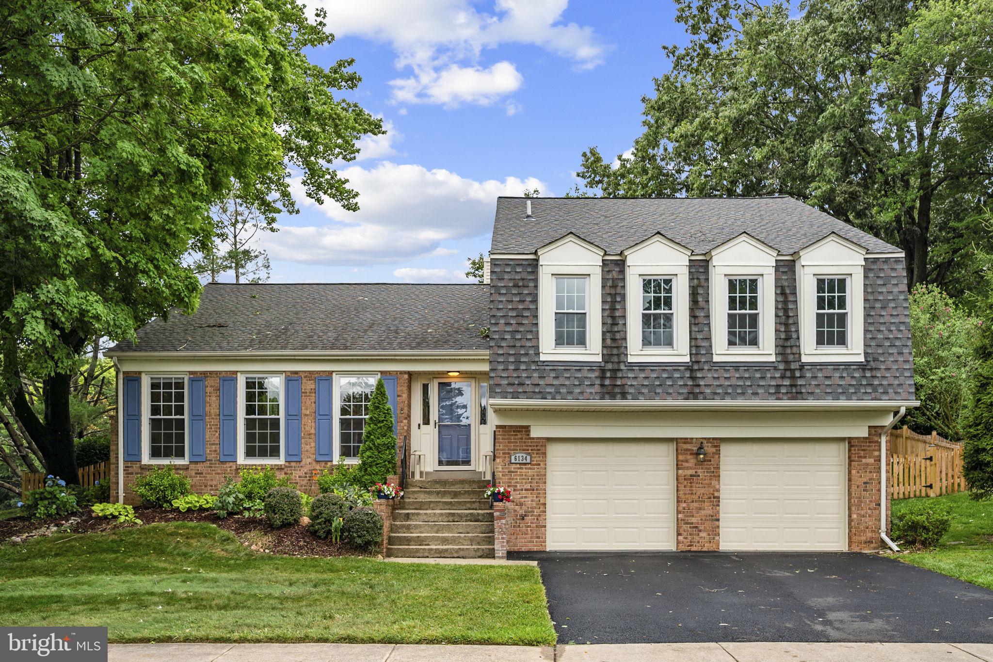 As you drive up to this lovely home, the welcoming curb appeal says "This is the one!" Situated on a corner lot you will immediately notice the abundance of trees, green space and beautiful landscaping.  The home looks crisp and fresh, benefitting from a newer roof, windows, garage doors and fencing. Once inside,  you will  sense that this was a cherished home that was upgraded over the years by the discerning homeowners. Warm, natural hardwoods grace the living, dining, kitchen and family rooms. The multi level living area provides architectural interest with a soaring vaulted ceiling. There is a separate dining room and the kitchen/family room combo has a wood burning fireplace and slider to the backyard (more on that later) Grow your own basil and other herbs in the greenhouse window over the sink. Stainless steel appliances, granite and butcher block counters lend appeal to the blue Shaker style cabinetry.  The primary suite has a walk in closet with  lots of shelving, and privacy glass French doors leading to the  remodeled bath.  There are two other bedrooms on this level (one with a wall of shelving that could handle a small library) and an updated bath. The lower level has a legal bedroom, full bath, recreation room and W/D.  You access the two car  garage (EXTRA deep) from this level. And now, the backyard...peaceful and private, you can enjoy the sounds of nature as you unwind on the ground level deck.  There is a nice balance between shady areas  and expanses of sunny lawn. The fully fenced back yard keeps your canine friends contained, but there is area behind the fence should you want to plant vegetables or more herbs!  This highly desirable  location can't be beat with a short walk to the F81 Express Bus to the Pentagon and easy access to shopping, FFX county parkway, VRE,  PLUS all  the wonderful amenities of Burke Centre Conservancy.  Come see this fabulous home ASAP.... It's Easy to SHOW;  It's Easy to LOVE;  It's an Easy decision to make it YOURS!