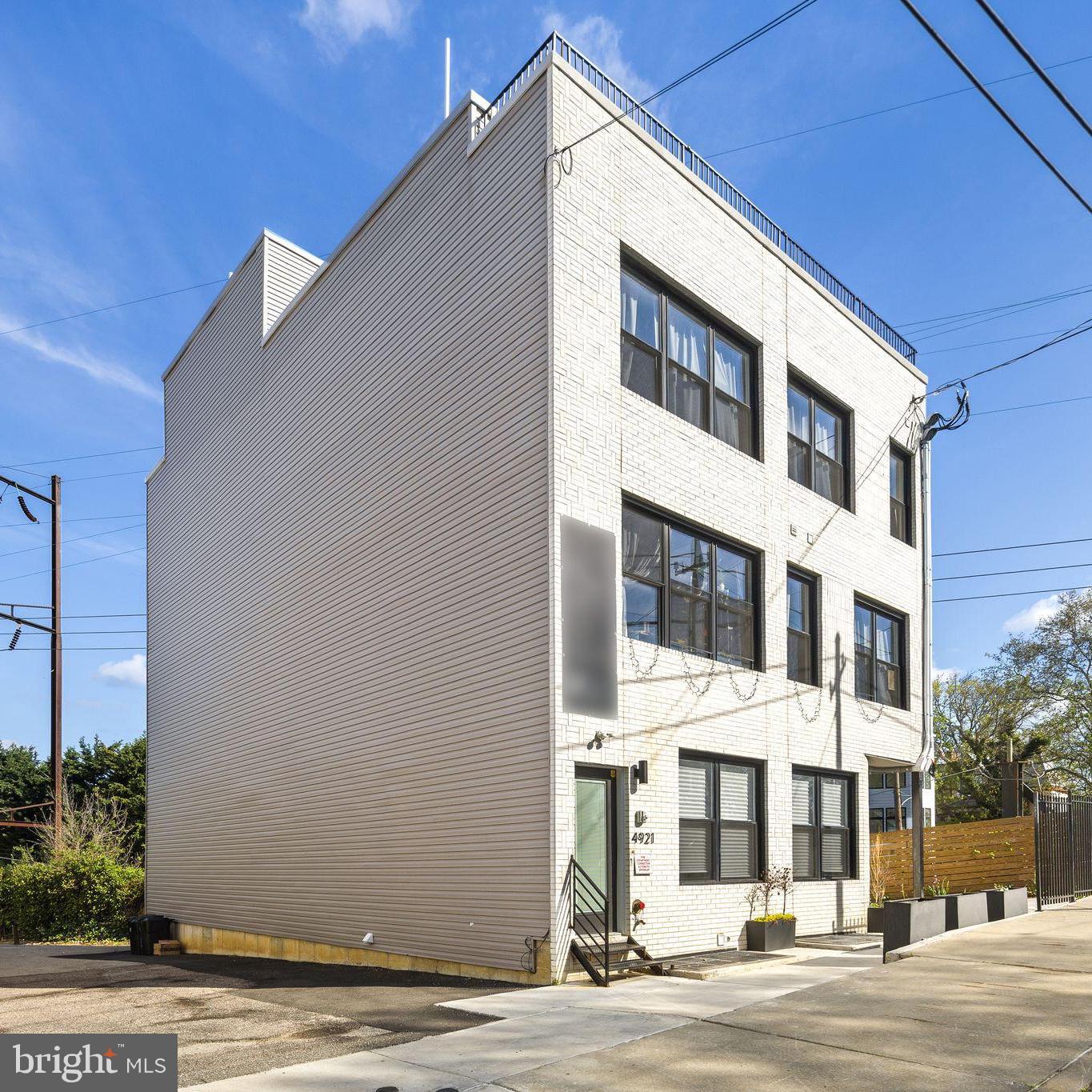 Welcome to 4921 Chester Avenue, a rare opportunity to acquire a fully leased, new construction 6-unit multifamily investment property in one of West Philadelphia’s fastest-growing rental corridors. Built in 2025, this turnkey asset offers approximately 4,300 square feet of gross building area and is positioned for immediate cash flow, long-term appreciation, and low-maintenance ownership. This stabilized apartment building consists of six residential units, including spacious 2-bedrooms and 1-bath residences. The third-floor units each feature private rooftop deck access, a highly desirable amenity that supports premium rents and strong tenant retention. Purpose-built for efficient ownership, this new construction multifamily property features modern building systems, energy-efficient mechanicals, updated infrastructure, contemporary finishes, in-unit washer and dryers, smart entry systems, and minimal near-term capital expenditure needs, making it an ideal hands-off investment for buy-and-hold investors, 1031 exchange buyers, and portfolio expansion. A major value driver is the approved 10-year tax abatement, keeping annual real estate taxes exceptionally low and significantly enhancing net operating income and investor returns. Combined with the benefits of new construction, this creates a highly attractive, low-expense, low-maintenance investment profile. Just half a block from 49th Street Station, this property offers unbeatable access to the Market-Frankford Line, multiple SEPTA routes, the 64 line, and the T3 line—providing seamless connectivity to University City, Center City, University of Pennsylvania, Drexel University, Children's Hospital of Philadelphia, and other major employment centers. This highly desirable transit-oriented location drives strong and reliable rental demand from students, medical professionals, university employees, and local workforce tenants alike. West Philadelphia continues to see significant redevelopment and steady housing demand, with rental rates showing consistent year-over-year growth. Positioned near major institutions and transit corridors, this asset is well suited for long-term appreciation, stable occupancy, and continued income growth. A rare opportunity to acquire a fully leased, new construction multifamily investment with immediate cash flow, low taxes, and strong upside in one of Philadelphia’s fastest-growing neighborhoods.