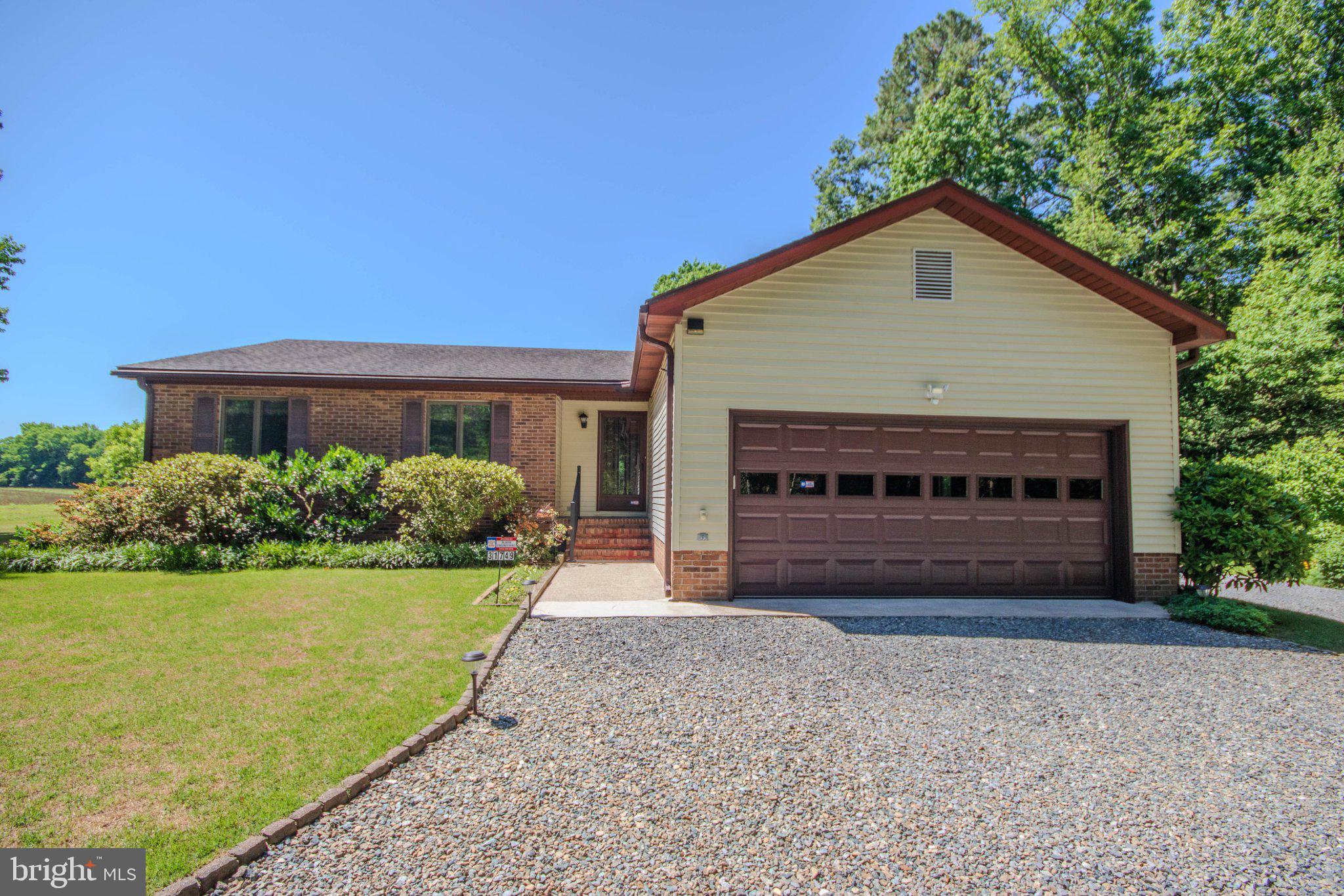 Your search ends here! This well-maintained rancher offers an open floor plan with 3 bedrooms and 2 full bathrooms. Enjoy the enclosed back porch featuring insulated windows, perfect for relaxing year-round. Additional features include a 14KW generator, driveway alert system, separate carport, and two outbuildings (8x10 and 12x24) for extra storage or workspace. The garage offers walk-up attic storage, and a new private driveway adds convenience and curb appeal. Cable service is available, and an additional connection has been installed throughout the backyard to provide extended coverage. This property has been thoughtfully cared for and is ready for its next owner!