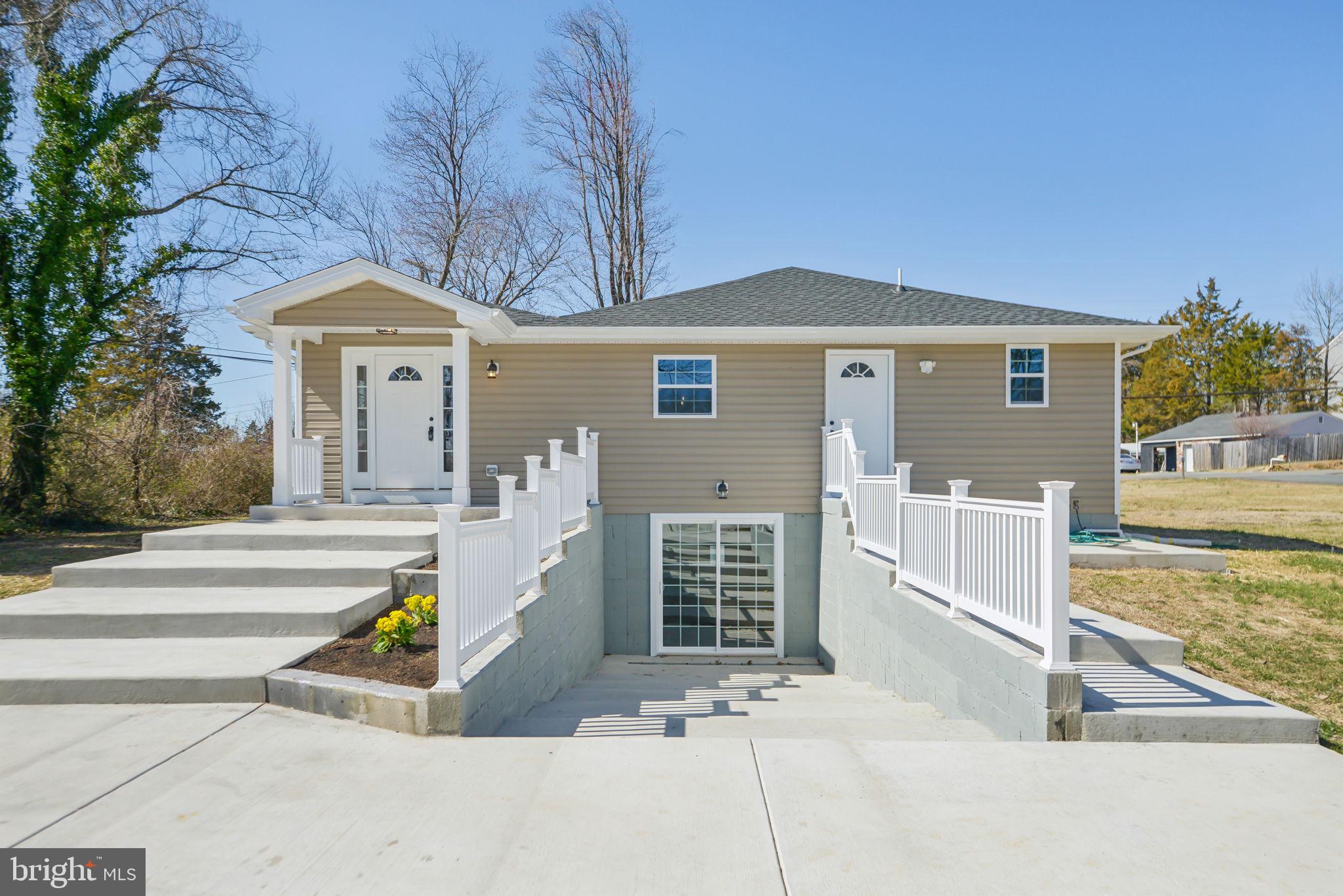 This beautiful two-level single-family home with 0.87-acre lot, is practically a brand-new home! located in STAFFORD HEIGHT neighborhood. ** Approximately 3,000 square feet of living area, tax records are not up to date. ** This home was completely redesigned with care and love. Brand new roof, siding, windows, doors, LVP flooring, all new electrical & electrical panel, new plumbing, new HVAC system, sump pumps, light fixtures, New front porch. ** This home combines modern elegance with comfort, making it a perfect retreat for today's lifestyle. ** On the main level, enter through the inviting open floor plan surrounded by natural light, showcases living and dining areas with a neutral color palette that set the tone for an inviting and sophisticated space. An elegant white style gourmet kitchen with gleaming granite countertops, kitchen island with charming pendant lights, stainless steel appliances, everything new!  Also offers 3 spacious bedrooms and 2 full bathrooms. ** The lower level displays a large recreation room, 1 full bathroom, a large flex room with many possible uses such as a 4th bedroom, guest room or office, with an oversized separate entrance for added privacy and convenience, making it perfect for potential rental income. ** This gem home is in corner lot around private bushes, plenty parking lot, huge front and back yard, great for gathering and entertainment. ** The pre-listing appraisal, completed on 12/31/2024, confirms the property's value is above list price ** instant equity potential. ** Property is located close to major commuting routes with easy access to I-95, shopping, restaurants, and just minutes to Stafford Hospital Center. ** Don't miss the opportunity to make this wonderful home yours!