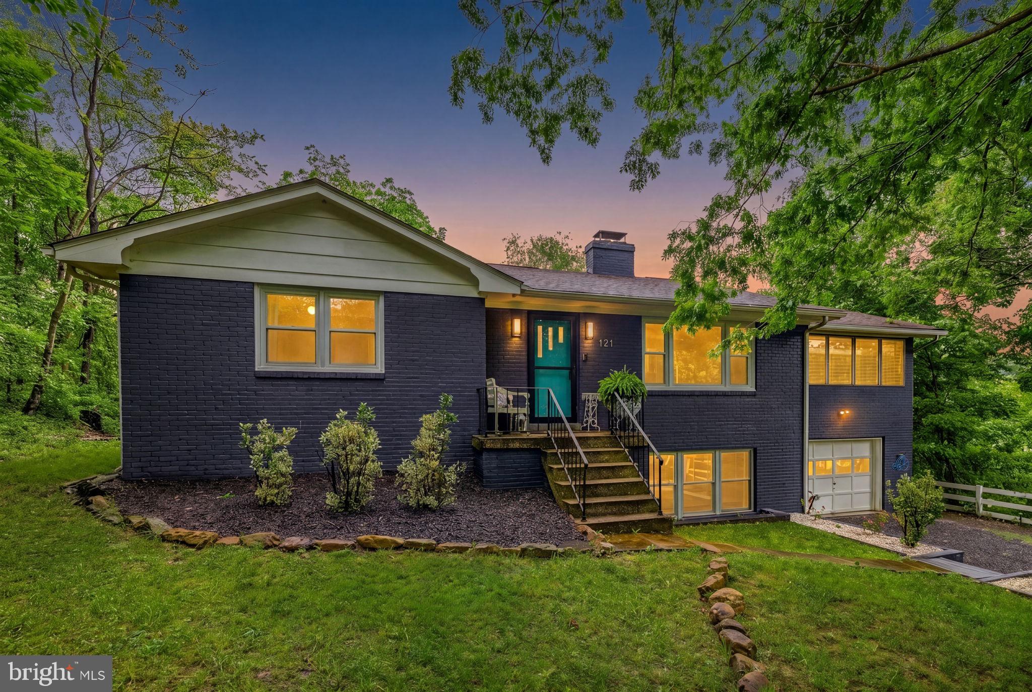 Lake and mountain views, a private in-ground pool, and an adjoining .63-acre lot — this beautifully updated Shawneeland home sits on .37 acres and conveys with an additional .63 acre of record (Tax Map ID #49A031A13A), for approximately 1 acre of mountain privacy. 

Filled with natural light, the home features hardwood floors, fireplaces throughout, and a renovated kitchen with quartz countertops, upgraded appliances, and a gorgeous blue tile backsplash. The charming breakfast nook is the perfect spot to start the day, while the stunning brick sunroom captures sweeping views of the lake, pool, mountains, and surrounding landscape from every angle. Whether used as a home bar, creative studio, plant room, or simply a place to unwind and gather, this is a space you'll never want to leave.
The spacious primary suite offers an updated bath with beautiful tile work, a soaking tub, separate shower, and generous walk-in closet, and a fully finished walkout basement adds flexible living space below. Outside, the in-ground pool, thoughtful landscaping, and peaceful surroundings make the entire property feel like a private escape.

Set against the backdrop of Great North Mountain, Shawneeland offers a spring-fed lake, sandy Cherokee Beach, playgrounds, fishing, and hiking trails — all with a low annual sanitary district fee and no traditional HOA. You're minutes from George Washington National Forest, roughly 12 miles from Historic Downtown Winchester's shops, wineries, and Old Town walking mall, and the same distance from Winchester Medical Center, the region's flagship hospital. Quick access to Routes 50, 522, and I-81 puts Northern Virginia and Washington, D.C. (about 90 miles) within reach — making this an ideal full-time residence or weekend mountain retreat. Frederick County Public Schools. New 40-year roof installed in 2020. Storage shed conveys. Xfinity highspeed internet available.