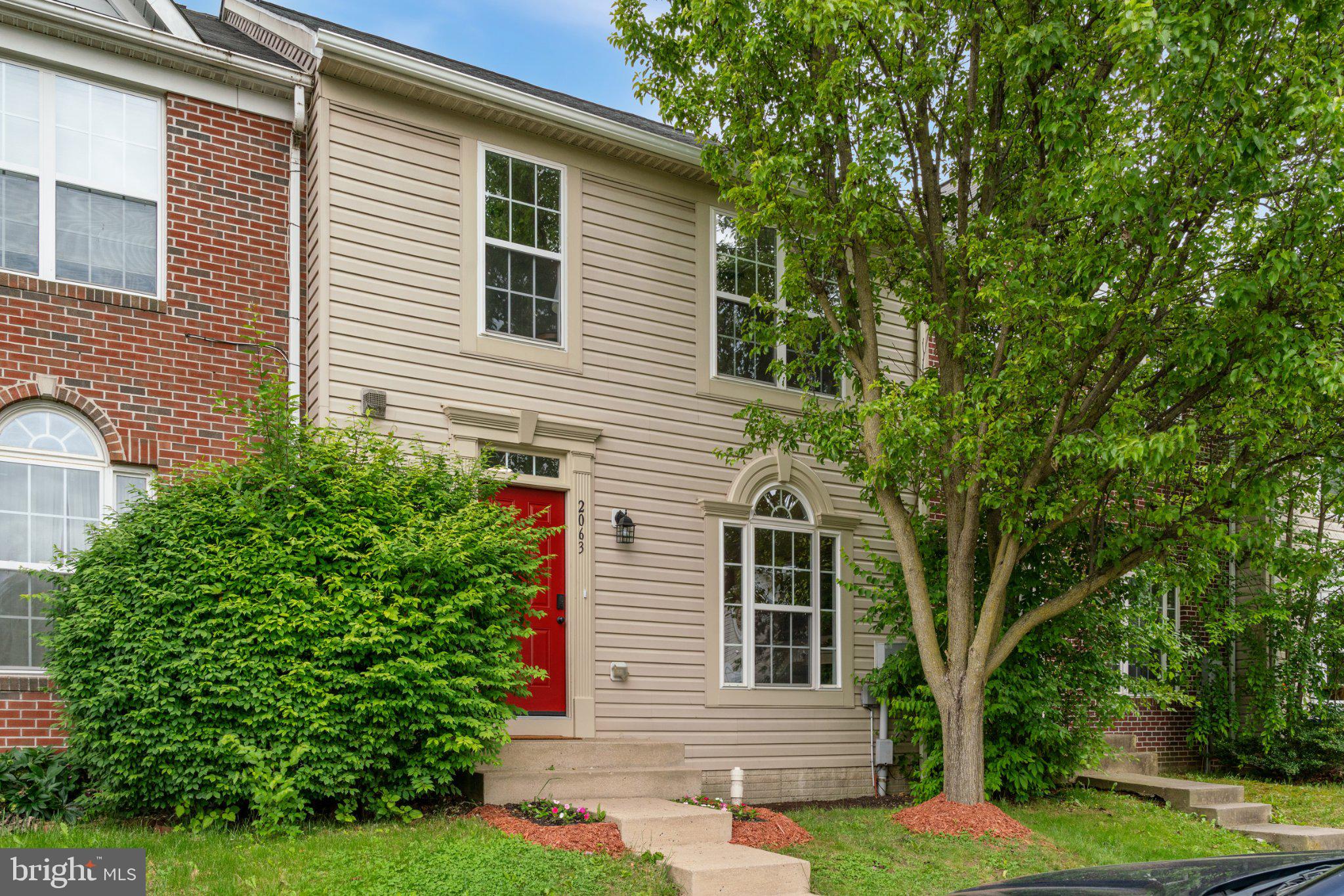 Beautifully renovated townhouse in the desirable Willow Brook community, where modern comfort meets classic colonial style. With a thoughtful renovation including a brand new kitchen, new flooring, updated bathrooms, landscaping, lighting, paint, and even a NEW architectural shingle roof, this home offers a fresh and inviting atmosphere, perfect for creating lasting memories. ...|||... 
The main level offers spacious, open plan living areas and a sunroom that truly lives up to its name with its southern exposure. ...|||... The upper level offers a primary bedroom with vaulted ceiling, a walk-in closet, a serene bathroom with natural light, and a sleek dual vanity with modern accents as well as two additional generously sized bedrooms and a second full bath. ...|||...  The fully finished basement continues this trend with a massive rec room that has the versatility to function as a single large space, or several smaller ones. ...|||... Two assigned parking spaces directly in front plus several visitor spots; two neighborhood playgrounds and Willow Brook park are all an easy stroll; and Market Square with it's shopping restaurants and Wegman's is just down the street.