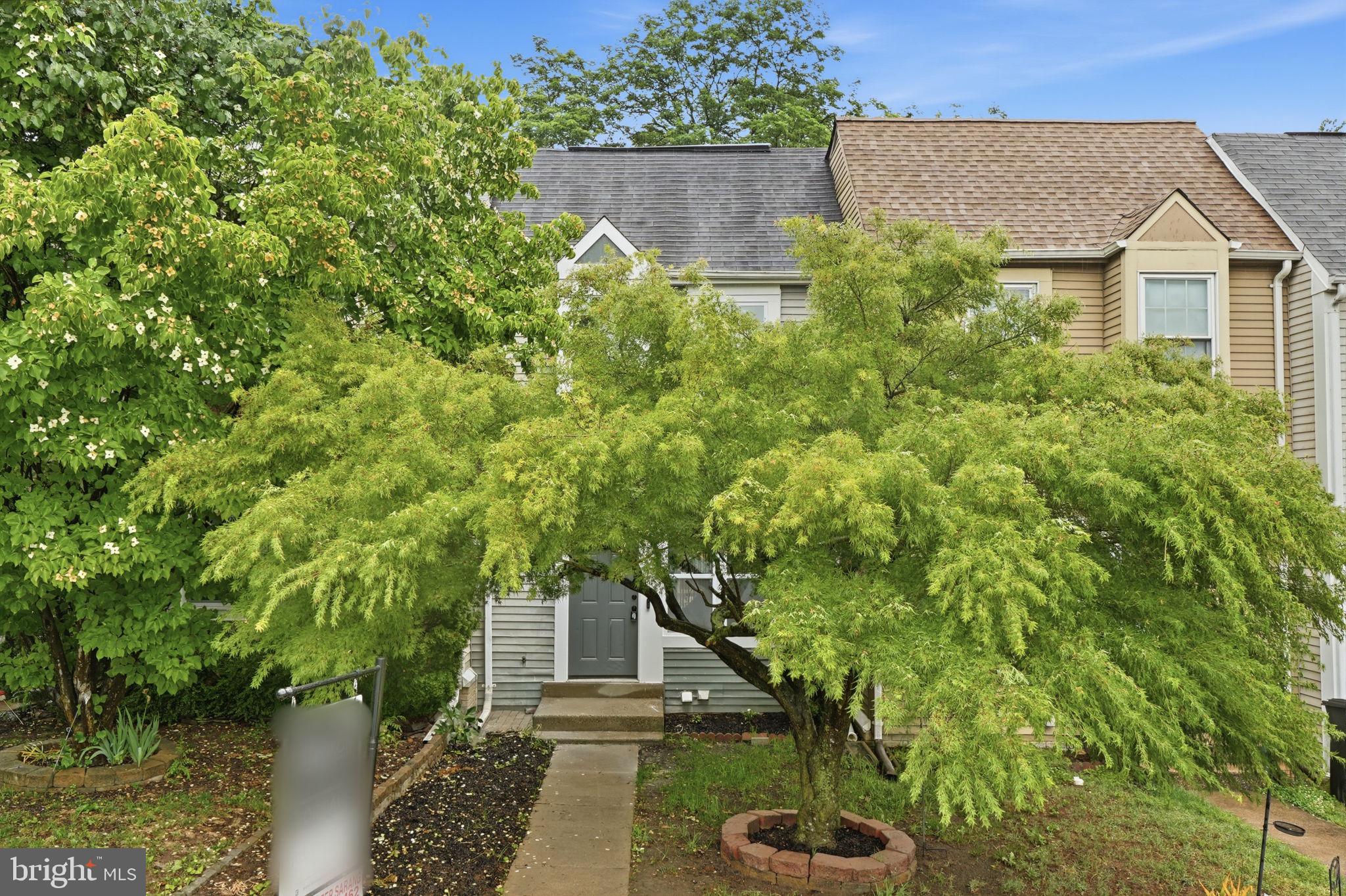 Back on market after additional improvements, including exterior siding updates and laundry room enhancements.

Fully renovated, design-forward townhome in a prime Woodbridge location in Rippon Landing. This home offers a flexible 3-bedroom-style layout, with two spacious bedrooms upstairs and an additional walkout lower-level room with a closet and full bathroom. The lower-level space is classified as NTC, making it ideal for a guest suite, home office, family room, or additional bedroom/flex space.

Thoughtfully updated with a clean, modern aesthetic, this home offers a seamless blend of elevated finishes and functional living. The brand-new kitchen features white shaker cabinetry, quartz countertops, stainless steel appliances, and a timeless layout, delivering both style and everyday practicality.

New LVP flooring and plush carpet run throughout, complemented by fresh paint and recessed lighting that creates a bright, cohesive feel across every level.

All bathrooms have been fully renovated with modern tile, updated vanities, and sleek fixtures, including a walk-in shower in the lower level. A main-level half bath adds everyday convenience an advantage not found in all homes within the community.

Additional highlights include brand-new Low-E windows and patio doors (2026), a Trex deck for low-maintenance outdoor living, and recent updates to major systems including the roof and HVAC (2025).

Community amenities include a pool and assigned parking, with an ideal location near I-95, Route 1, Potomac Mills, Stonebridge at Potomac Town Center, and Quantico.

A true turnkey home with a modern, design-driven feel move right in and enjoy.