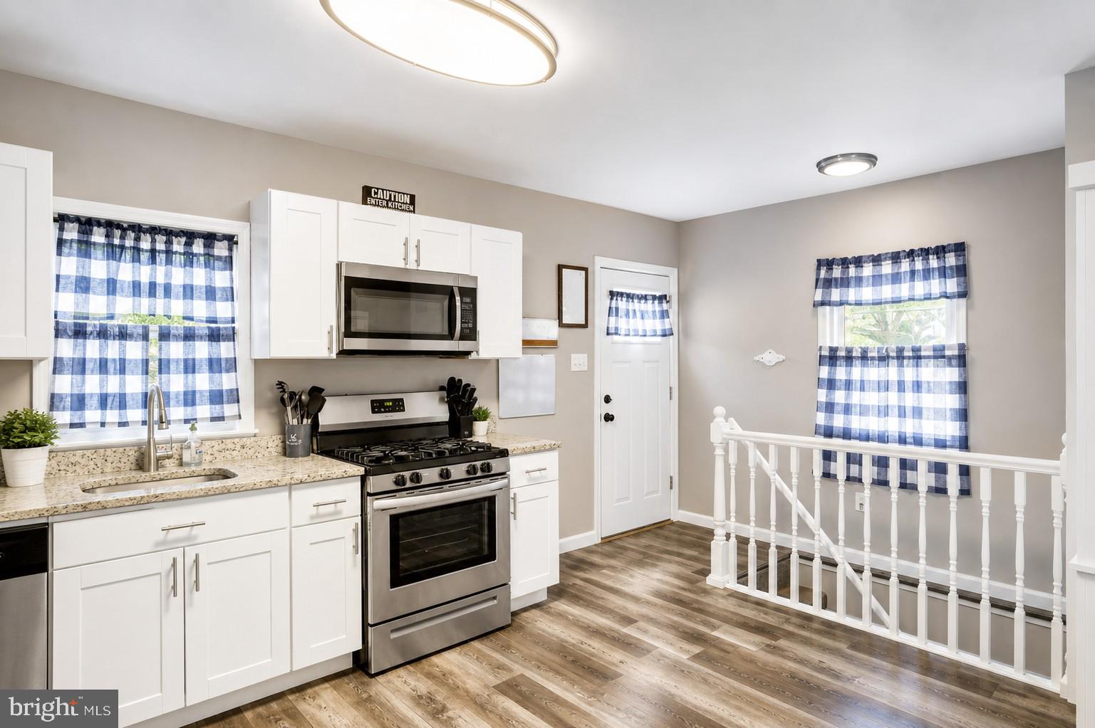 This move-in ready home has been nicely updated and is ready for its next owner. The kitchen features granite countertops, stainless steel appliances, and white shaker cabinets. On the main level, you’ll find 2 bedrooms and a full bathroom, plus a finished upper level with a spacious 3rd bedroom. The fully finished basement gives you even more space with a 4th bedroom, another full bathroom, and a family room that’s great for hanging out or entertaining. With updated flooring, fresh paint, and more, this home checks all the boxes. Come take a look before it’s gone!