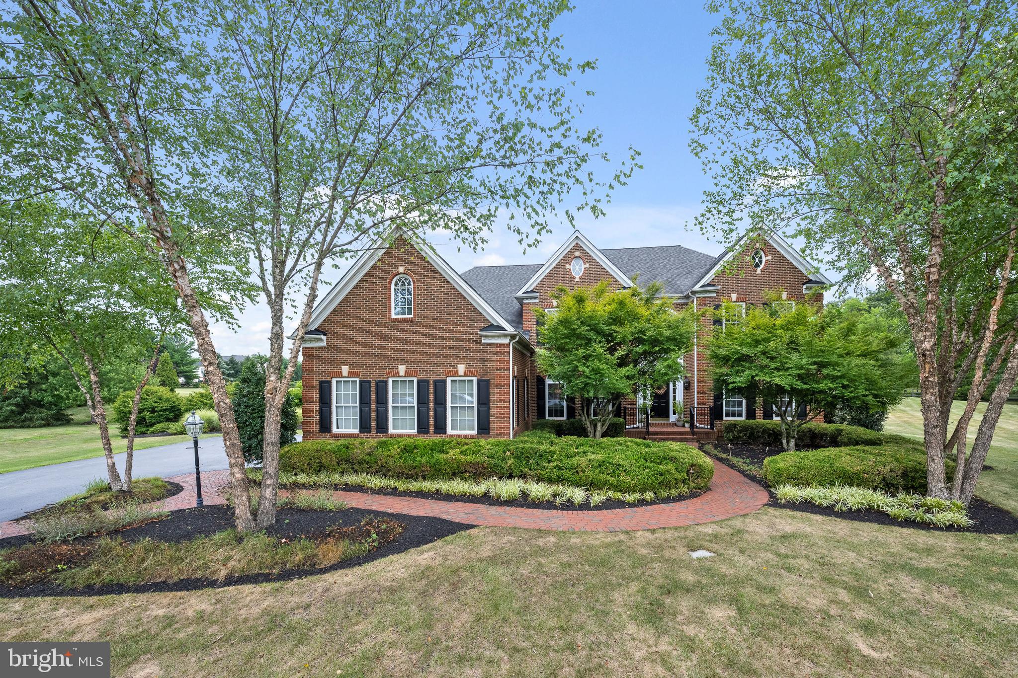 Move in before the start of the school year! Look no further than this stunning luxury home in the highly desirable Anderson Farm neighborhood where properties rarely hit the market! Beautifully situated on over 3.7 flat lush acres, you will enjoy wonderful privacy and space in this very special enclave of upscale homes. Some notable highlights in this stylish 5 Bedroom, 5.5 Bathroom home include an open concept floor plan with dramatic ceilings, front and back staircases, Bathrooms in every 2nd floor Bedroom, a 1st floor Office, rich hardwood flooring throughout the main level, tremendous closets and storage, a finished walk out lower level with built-in entertaining bar and separate gym, fantastic outdoor covered patio, whole house generator, a 3-car Garage and so much more. Approaching this brick front home with mature landscaping you will know you are in for a treat. Once inside, the high ceilings and open spaces will be sure to delight. The welcoming 2 story Foyer showcases an impressive front staircase while the Living Room and gracious Dining Room are on either sides of this lovely entry. Continue through to the heart of the home showcasing the expansive Kitchen, Breakfast Room and terrific Family Room. Enjoy cooking in the well-designed Kitchen with its large center island, wood tone cabinetry, stainless appliances, granite counters and walk-in Pantry. There is plenty of room for sit-down meals in the Breakfast Room that provides access to the patio and breathtaking backyard. The 2 story Family Room with oversized Palladian windows creates such a light filled environment and features a wall of custom shelving and cabinetry with a gas fireplace. The living space on this floor is so well suited for everyday living as well as larger scale entertaining. A convenient and private home Office is ideal for remote working while the Powder Room, Laundry and Mudroom complete this living level. Ascend either the front or back staircases and discover the landing which overlooks both the Foyer and the Family Room and creates wonderful spacing between the 4 impressive Bedroom Suites. The gracious Primary Suite with a tray ceiling in the bedroom offers a sitting area which is a great flexible space to custom suit your needs. A very large and outfitted walk-in closet is a treat and the Bathroom is generously sized with 2 separate vanities, an over-sized stall shower and soaking tub. Three more Bedrooms all including ensuite Bathrooms with crisp white fixtures and walk-in closets complete this floor featuring brand new carpet throughout.  The walk-out Lower Level provides terrific recreation space with a built-in bar, separate exercise room, a Bonus Room currently utilized as a guest room, a full Bathroom and plenty of storage space. Outdoors, the backyard setting is spectacular with the awesome covered stone patio with built-in grill, TV cabinet, heaters for cooler weather and space to accommodate many for nearly year-round outdoor fun! A separate stone firepit is another great gathering spot to enjoy the beautiful landscape and expansive yard. This conveniently located property is minutes from Valley Forge National Park, vibrant Phoenixville Borough, the Main Line, King of Prussia and a plethora of recreational outlets, walking trails, boutiques and upscale restaurants. In award winning Phoenixville school district and near to numerous private academies, the Paoli Amtrak train station and major arteries, this superb location is tough to beat. Don’t miss this fantastic opportunity to make this special property your own. Professional Photos Coming...