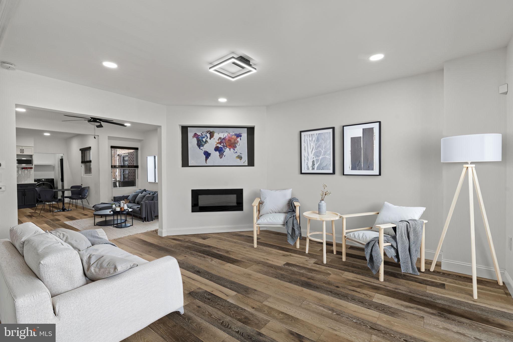Step into this meticulously maintained 3BR, 1.5BA Wynnefield rowhome, a move-in-ready gem that perfectly balances modern interior design with unbeatable convenience. The current owners have added a beautiful front garden, enhancing the home's curb appeal and creating a "cozy" first impression for guests.  Originally renovated in 2019, the home welcomes you with an open-concept main level featuring contemporary flooring, recessed lighting, and a sleek eat-in kitchen equipped with granite countertops and stainless steel appliances.

The main level also provides the rare urban convenience of a laundry area and a half bath located directly off of the kitchen.  The upper level boasts three comfortable & carpeted bedrooms and a modern full bathroom with designer tile work, spacious glass-enclosed shower and modern stand alone tub.  

For added utility, the versatile and finished walkout basement provides high ceilings and ample storage with direct access to the 1-car attached garage. The home is also smart-home ready, featuring a Nest thermostat and professional network wiring (COAX & Cat6) run from every floor to a central hub in the basement—perfect for seamless remote work or gaming.

A Quiet & Connected Lifestyle

Located on a very quiet street, this home is a "Commuter’s Dream" and an ideal fit for first-time buyers, small families, or investors looking for St. Joseph’s University student housing. Enjoy the peaceful neighborhood feel while remaining just minutes from the action:

Effortless Commuting: Only a 15-minute train ride to Center City or a quick 15-minute drive to the shops and dining at Suburban Square or City Ave.

Easy Access: Perfectly situated with rapid access to Route 76 and Route 30 (Lancaster Ave).

Peace & Quiet: Exceptionally quiet and "easy to get to" location that friends and family love to visit.

Whether you are looking for your first home or a high-demand rental property near the university, 2118 N Wanamaker St offers the modern finishes and prime location you’ve been searching for. Schedule your showing today!