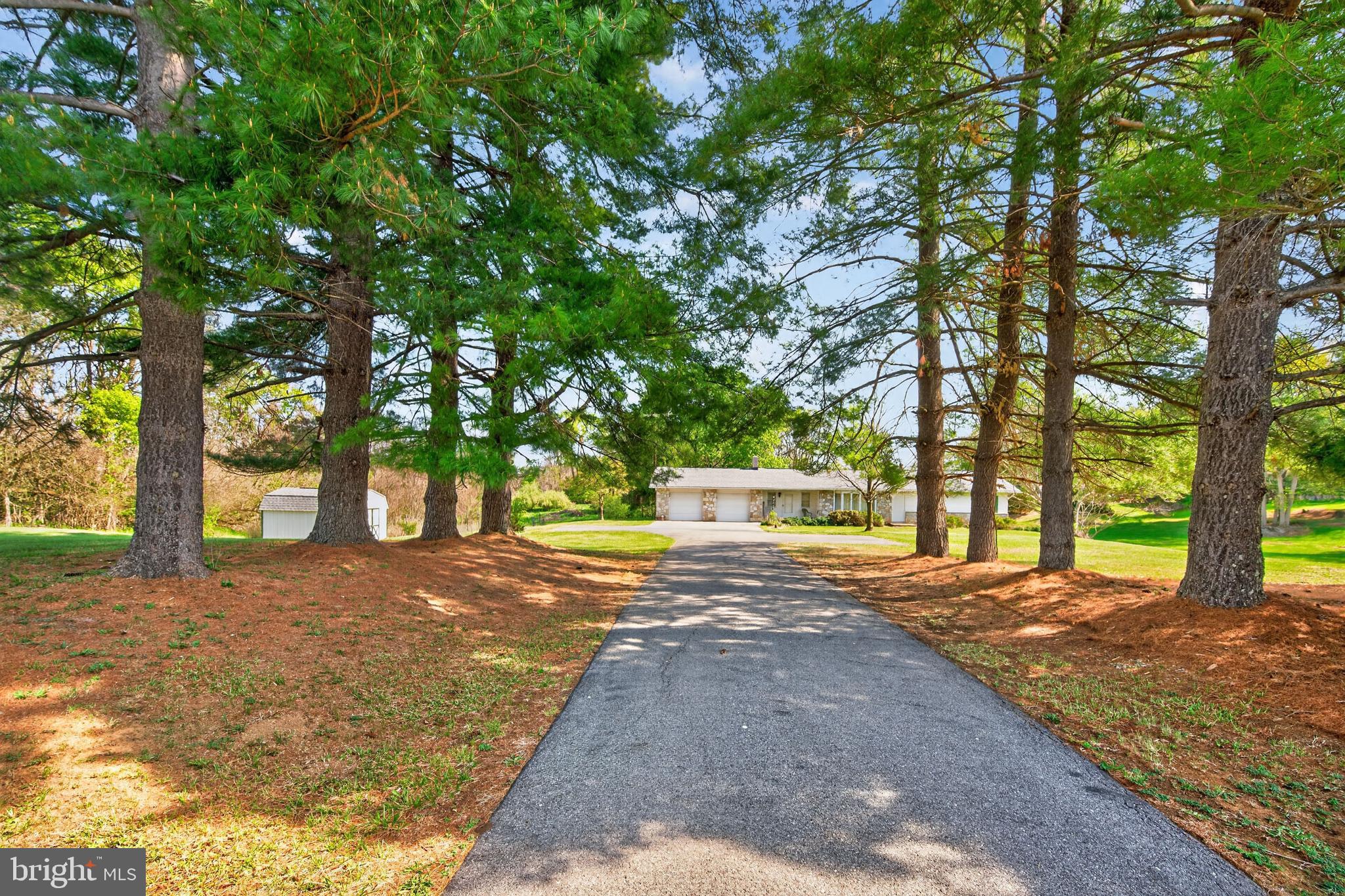 Opportunity knocks with this spacious property offering flexibility, functionality, and future potential. Originally built in 1965 with a thoughtful addition completed in 1989, this home blends classic character with expanded living space.

Inside, you’ll find hardwood flooring throughout the living room and bedrooms, while the kitchen and family room feature durable laminate for easy maintenance. The large eat-in kitchen is designed for everyday living and entertaining alike, complete with peninsula seating and a dedicated dining area. A hearth is already in place, ready for your heating stove of choice—adding both charm and efficiency.

The full walk-out basement provides additional space and possibilities, while the attached 2-car garage offers convenience. Just off the rear of the garage, a separate-access room presents an excellent opportunity for an efficiency apartment, guest suite, home office, or studio.

Outside, the property continues to impress with 3.67 acres—potentially subdividable (buyer to verify)—plus a large storage shed and an additional driveway with turnaround access for ease of entry and extra parking.

Major updates include a new roof and deck (2022), new A/C unit (2025), and an oil furnace replaced in 2010.

This property is being sold as-is, where-is. Buyers are encouraged to perform their own due diligence. A rare chance to invest, customize, and create something special—don’t miss it.