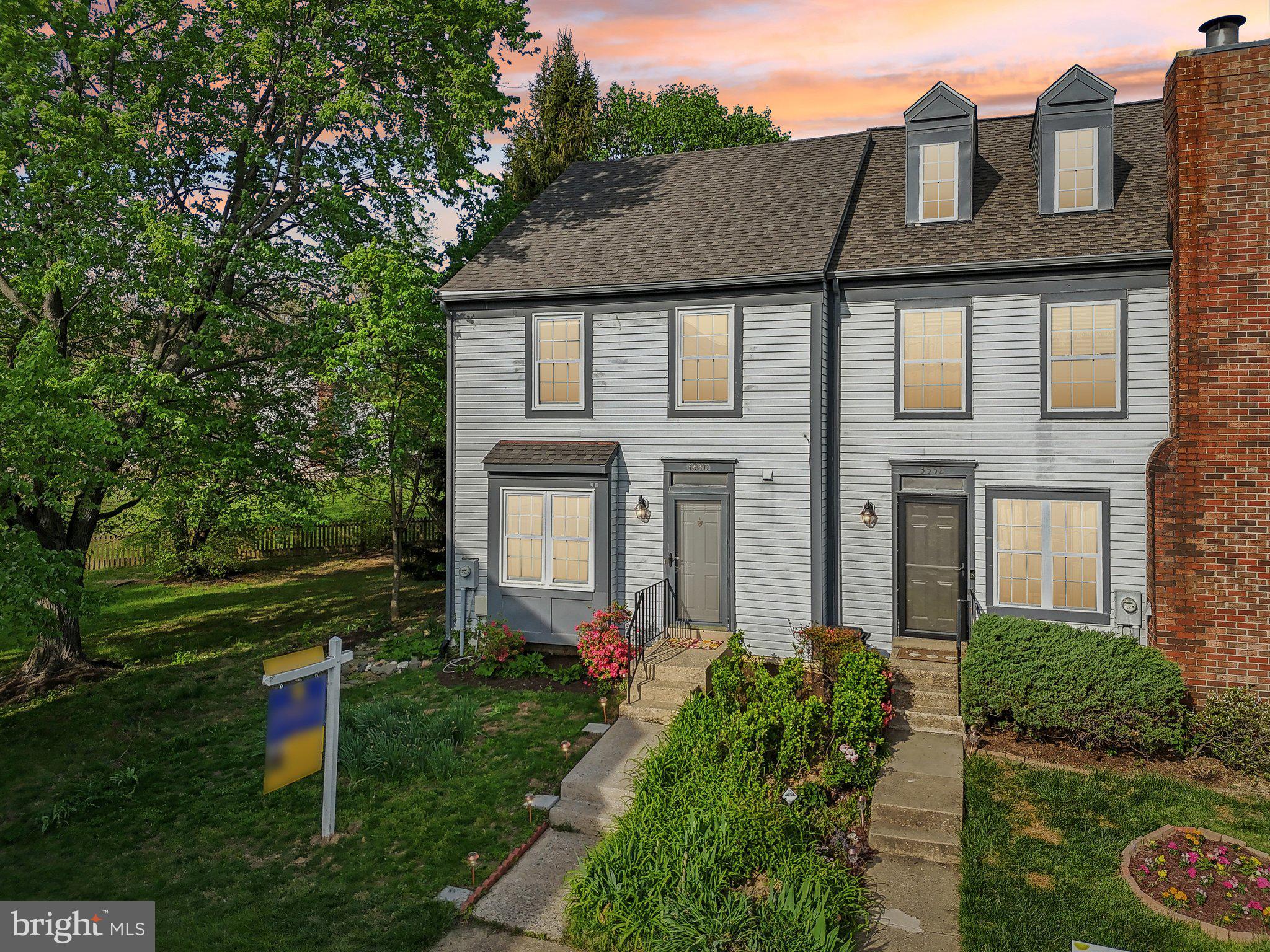 Welcome to this beautiful end unit townhouse in the desirable Greencastle Lakes community, offering an abundance of natural light and a private backyard surrounded by open space. Sunlight streams through the front-facing kitchen and side windows in the dining room, creating a warm and inviting atmosphere throughout. The main level features luxury vinyl tile in the kitchen, foyer, and powder room, while hardwood floors flow through both the dining and living rooms and throughout the upper level as well.. The kitchen boasts white cabinetry with additional storage added under the breakfast bar, a pantry,  and new stainless steel appliances. Continue on through the foyer to a formal dining room and a sunken living room.  A cozy wood-burning fireplace anchors the living space, with sliding glass doors leading to a rear deck—perfect for outdoor entertaining or peaceful relaxation. Upstairs, you’ll find  the spacious primary suite with vaulted ceilings and an updated private bath. Two additional bedrooms and a full hallway bathroom complete the upper level. Downstairs, the finished basement offers brand-new carpeting and a large laundry/storage room, providing plenty of extra space for work or play. Recent upgrades include a new roof (October 2024) and a new heat pump (March 2025), ensuring peace of mind for years to come. Built by renowned builder Winchester Homes, this home offers quality craftsmanship and timeless appeal. Enjoy all the community has to offer, including scenic walking trails, tranquil lakes, a private community pool, clubhouse, tennis courts, tot lots, and ample guest parking —all set within a well-established neighborhood with sidewalks and lush landscaping. Area amenities include nearby public transportation, close to shopping and restaurants, and Fairland Regional park! Don’t miss the opportunity to make this your dream home today!