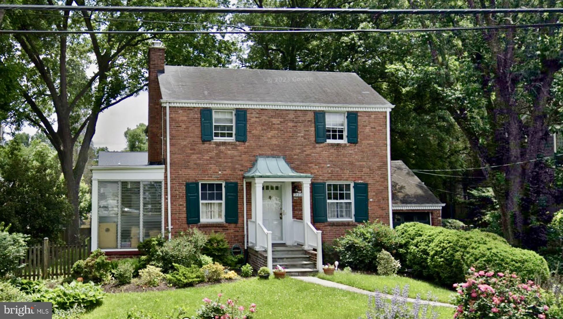 **Offer deadline 11am on Tuesday 3/25**Open Saturday 3/22 and Sunday 3/23 from 2-4 pm! Welcome to this charming Colonial in the heart of Falls Church City! Impeccably maintained by loving owners over 35+ years, this beautiful home offers 4 bedrooms and 3.5 baths on 3 fully finished levels with a 1 car garage.  Upon entry, a formal living room with wood burning fireplace and spacious dining room border either side of the home and lead to 1500 sqft rear addition with an open kitchen, sunny breakfast area, large island, and relaxing family room with glass doors out to the rear deck.  An enclosed sun porch off of the living room offers a lovely space for relaxation or working from home.  The upper level features 3 bedrooms and 2 baths, which includes an owner's suite with updated walk in shower and walk in closet.  The fully finished lower level includes a spacious den with gas fireplace and walk out steps to the rear yard, a guest room , 3rd full bath, laundry and bonus storage.  Primely situated on a 1/4 acre flat lot with beautiful landscaping, mature trees and plenty of room to play or garden!  Unbeatable location in a peaceful neighborhood with easy access to top-rated schools, retail, restaurants, and entertainment options in downtown Falls Church City, including the brand new Whole Foods, Founders Row, parks,  and W&OD trail.  Close proximity  to both West Falls Church Metro (1.3 miles) and East Falls Church Metro (1.6 miles) and easy access to major commuting routes along 495, 66, Rt. 7 and more.  Welcome home!