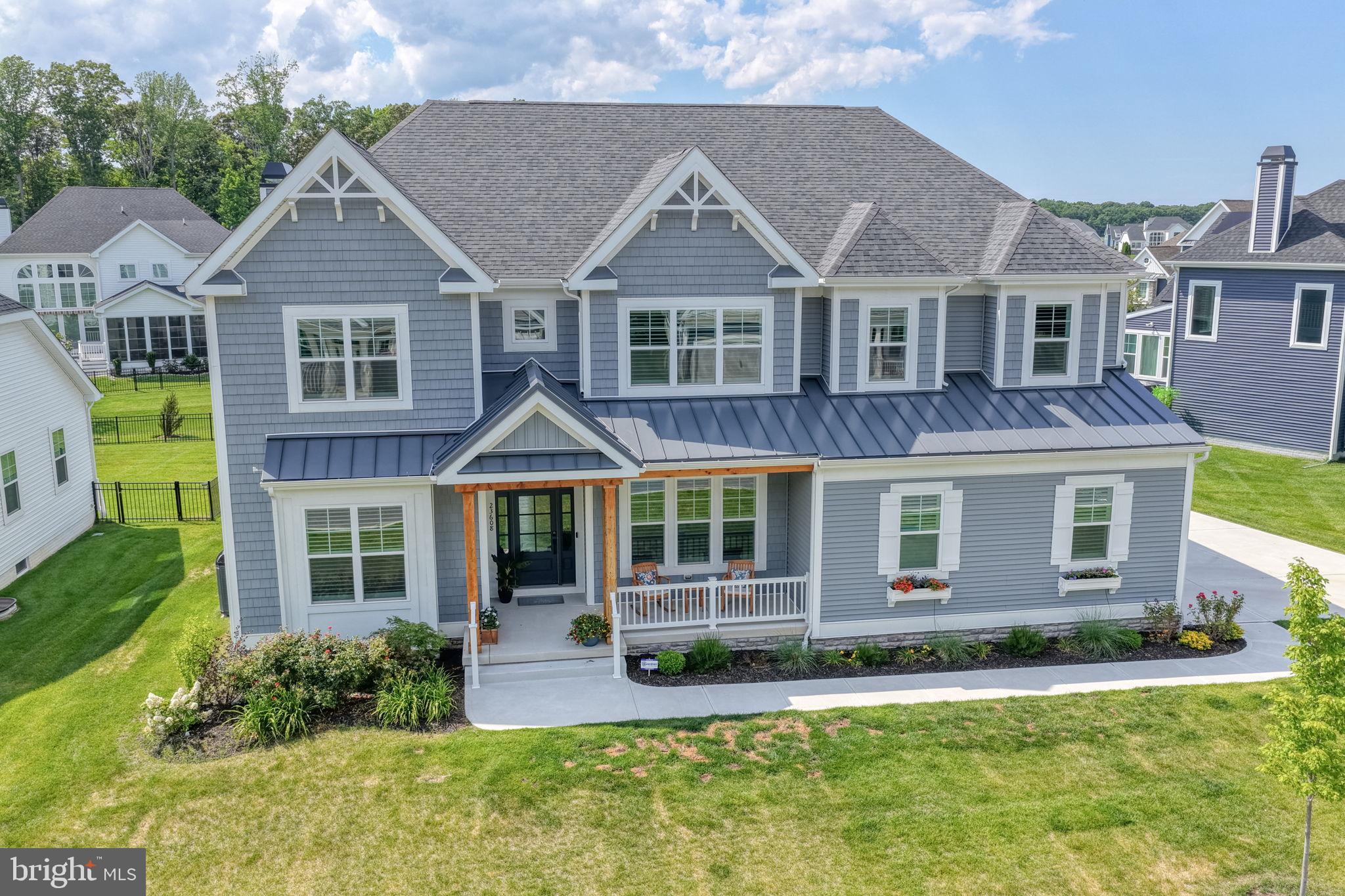 Experience exceptional craftsmanship and thoughtful design in this stunning Waterford model located in the award-winning Welches Pond community in Lewes. This expansive home offers a highly desirable floor plan featuring a first-floor owner’s suite and guest suite on the first level in addition to 3 bedrooms, 2 bathrooms, a large bonus room AND a spacious loft on the second level.  Need even more space? There is also an unfinished basement with plumbing rough-in for future expansion.  At the heart of the home is the upgraded Chef’s Kitchen, showcasing custom maple cabinetry with designer finishes, a large command-center island, quartz countertops, a farmhouse sink, brushed gold fixtures, pot filler, and a premium Monogram appliance package including a 48-inch built-in refrigerator, 36-inch gas range and central vacuum. The great room is enhanced by additional windows, rich hand-scraped hickory flooring, recessed lighting, and a striking Heat & Glo fireplace, creating the perfect space for entertaining or relaxing.  The luxurious owner’s suite features a spa-inspired bath with a frameless glass shower and elegant finishes throughout. Exterior highlights include a welcoming concrete front porch with wood columns and beam accents and a side-load garage with a 4-foot extension, as well as professional landscaping.  Additional upgrades include a high-performance HVAC system, Home IQ smart home package and 2 tankless water heaters. Located just minutes from downtown Lewes and Rehoboth, beaches, shopping, dining, and boating, this beautifully appointed home offers the perfect blend of coastal elegance and modern convenience. Call today to schedule a private tour! 
 
Welches Pond was just recognized as the Community of the Year in Sussex County, Best Clubhouse design, and Best Interior of Clubhouse at the 2026 Regal Awards which recognizes excellence in Delaware Homebuilders.  Resort-style living awaits with an impressive collection of amenities designed for relaxation, recreation, and an active coastal lifestyle. Residents enjoy a community pool, a beautifully appointed clubhouse with a fitness center, screened lanai, pickleball courts, basketball hoops, and convenient kayak launch and storage right on Love Creek. Enjoy low-maintenance living with lawn care and trash service included in HOA, making everyday life effortless.