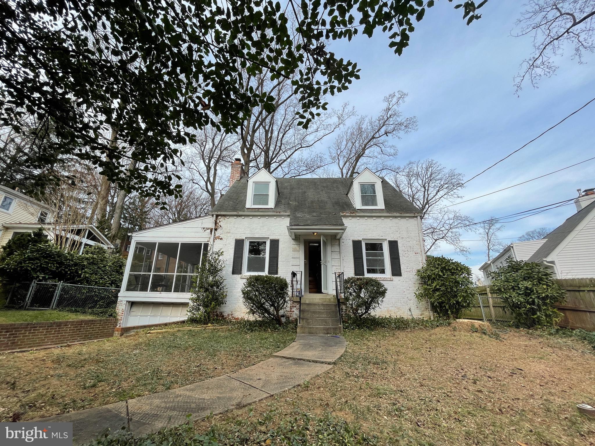 Within Walking Distance of NIH & Approx a Mile to Walter Reed and Suburban Hospital** Home features wood floors,  Main level features an en-suite bedroom, living room with wood-burning fireplace, dining room, kitchen and a screened-in porch. Upper level features 2 bedrooms and a full bath.