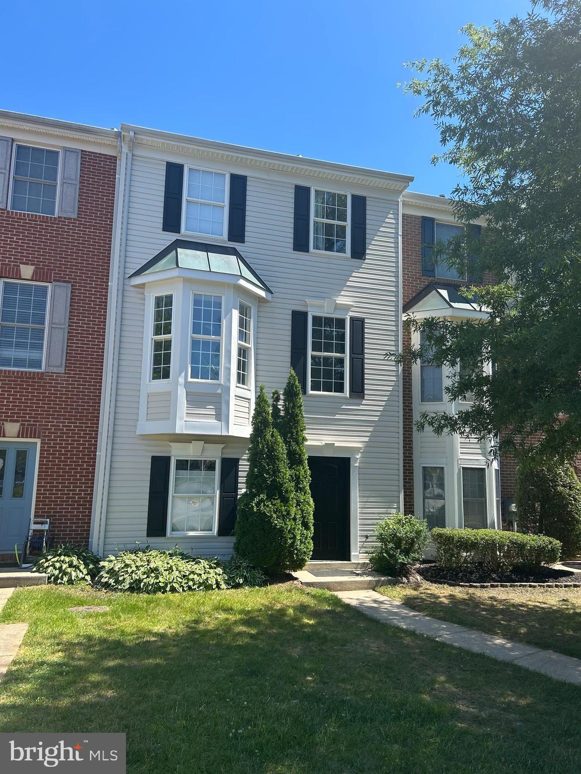 Welcome to Crofton Farms! This stunning 3-story townhome offers the perfect blend of style, space, and location — and has been meticulously updated throughout. With 4 bedrooms, 2.5 baths, and a bump-out that adds bonus living space on all three levels, you'll enjoy more square footage than most townhomes in this price range.
The open and airy floor plan is filled with natural light, and nearly every surface has been refreshed. Updated flooring flows through the kitchen, dining room, family room, and entry level, while fresh carpet runs through the bedrooms. Custom window coverings, updated lighting fixtures, and a beautifully renovated kitchen give the home a clean, modern feel from top to bottom. A stylish French door leads into the family room, adding an elegant touch. The primary suite is a true retreat — generously sized with the kind of space that makes coming home the best part of your day.
Major systems and appliances have been replaced in recent years: brand new water heater (2 months), refrigerator (2 years), dishwasher (3 years), stove (5 years), and washer and dryer. The front door, dining room windows, sliding doors on both levels, and rear entry-level windows have all been replaced. EV drivers will love the Tesla charger.
Out back, enjoy the rare luxury of backing to a bird sanctuary — a peaceful, natural escape right outside your door. Two dedicated parking spots, proximity to Waugh Chapel shopping, and quick commutes to Fort Meade, D.C., Baltimore, Annapolis, and the MARC train make the location as practical as it is desirable.
Included with the sale: Tesla charger, all mounted TVs, custom window coverings, light fixtures, and a home warranty for added peace of mind. Move-in ready and waiting for you.