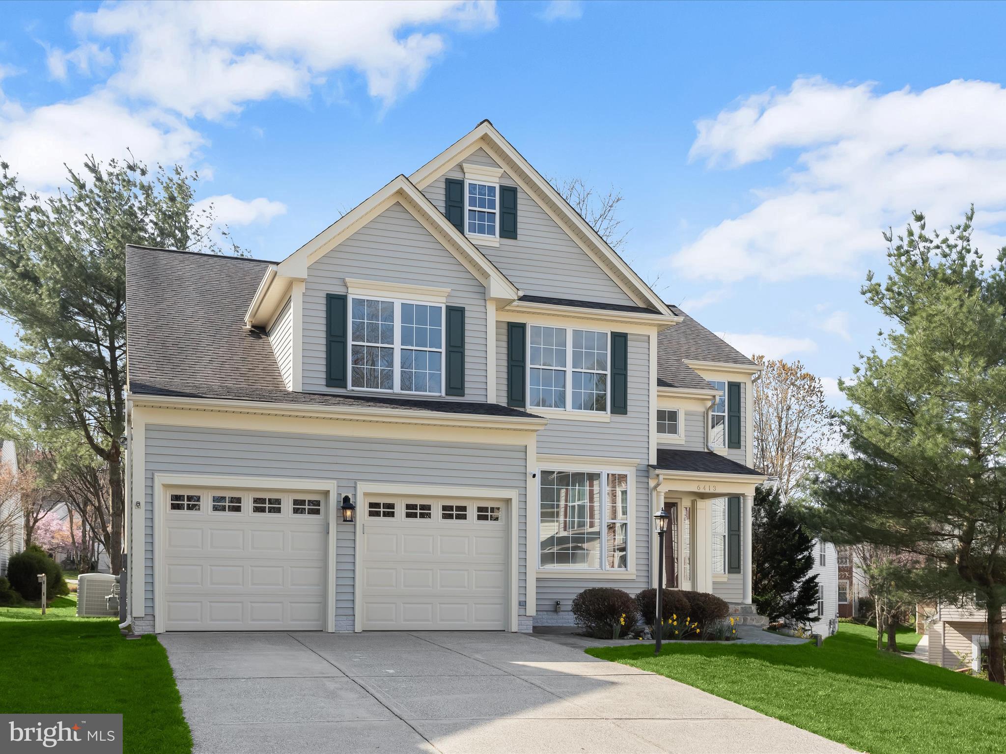 Experience timeless elegance in this stunning Colonial, perfectly positioned on a quiet cul de sac. This meticulously maintained home boasts a sun-drenched open floor plan, highlighted by a soaring two-story ceiling and refined architectural details. Recent updates include fresh interior paint, new carpet, an updated deck, slate walkway, garage door, and more, ensuring modern comfort with classic charm.  Step into the foyer, where gleaming hardwood floors and elegant accent molding set the tone for sophisticated living. The formal living and dining rooms exude grace and style, while the chef’s kitchen is a masterpiece—featuring quartz countertops, an island breakfast bar, stainless steel appliances, and a bright breakfast nook offering direct access to the deck.  The family room impresses with its dramatic 2-story ceiling and modern gas fireplace with a sleek grey stone surround. Glass French doors open to a private home office, and a powder room and laundry room complete the main level.  Retreat to the expansive primary suite, offering two walk-in closets and a spa-inspired ensuite bath with a dual vanity, soaking tub, and separate shower. Three additional bedrooms and a beautifully appointed full bath complete the upper level.  The finished lower level is an entertainer’s dream, offering a spacious recreation room, two versatile bonus rooms, a full bathroom, and a generous storage area.  Outside, enjoy serene outdoor living on the expansive Trex deck, overlooking a lushly landscaped yard with mature shade trees—the perfect setting for relaxation and entertaining.  Ideally located with easy access to major commuter routes and just moments from premier shopping, dining, and entertainment.  A rare opportunity to own a truly exceptional home—schedule your private tour today!