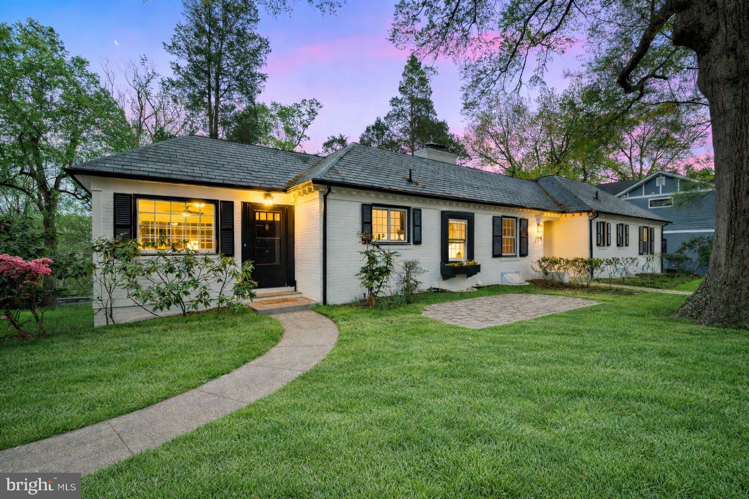 The Ultimate Kensington Estate—where nature, privacy, and unmatched convenience converge in the highly desirable Rock Creek Hills community. Listing price under appraised value. Beautifully renovated home with the first-floor primary en-suite you always wanted. There are 3 bedrooms and 2 full bathrooms on the main level. You have separate large living and dining room areas. What a striking fireplace and picture window view to your large backyard in your living area. The dining area leads to a great sunroom/bonus room that offers flexibility for your lifestyle. Your private driveway leads to a large 2 car garage and a separate entrance to the above-ground lower level. Sunlit lower level has another 3 bedrooms and 1 full bath, perfect for today's multigenerational family or and au pair suite. Set on an expansive 0.56-acre (24,000+ sq. ft.) level lot, this exceptional property offers direct access to Rock Creek Park, placing miles of scenic trails, fitness stations, and the iconic Beach Drive bike paths right at your doorstep—perfect for cycling, running, or walking all the way into Washington, DC. Enjoy the unique benefit of weekend road closures along Beach Drive, creating a peaceful, park-like setting for the community. Raymoor Road is not a through street, so it has very limited traffic.  Ideally located just 1.7 miles to Forest Glen Metro Station (Red Line), and 1.3 miles to the Town of Kensington Safeway and MARC Train Station, this home also provides close proximity to major employment hubs including NIH (National Institutes of Health), Walter Reed National Military Medical Center, and Naval Medical, with easy access to Union Station and Capitol Hill via the MARC.

Inside, the home is thoughtfully designed for modern living and multi-generational flexibility, featuring all brand-new appliances, a brand new AC system, a 220V electric vehicle charger in the garage, and separate washer and dryer units on both the upper and lower levels. The fully finished lower level includes a private entrance and functions perfectly as an in-law suite or separate living space with a kitchenette. Additional infrastructure includes hot and cold water lines already installed in the attic for a future fourth bathroom or wash area. Major systems have been well maintained, including a water heater installed around 2017 and a durable 40 plus year architectural shingle roof replaced in 2017. Enjoy views of the iconic Kensington Mormon Temple while residing on a quiet, low-traffic street known for its mature trees and tranquil setting.

Blending small-town charm with big-city convenience, this home is moments from Old Town Kensington’s beloved Antique Row, local coffee shops, and vibrant Saturday Farmers Market, while also being a short drive to the renowned dining and shopping of Downtown Bethesda and Westfield Montgomery. Zoned for the highly regarded Montgomery County Public Schools, including the Bethesda-Chevy Chase (B-CC) High School cluster, this property offers not just a home, but a lifestyle—an extraordinary opportunity to own an all brick home on a wonderful lot with main level living potential, surrounded by nature yet seamlessly connected to the best of the DC metropolitan area.