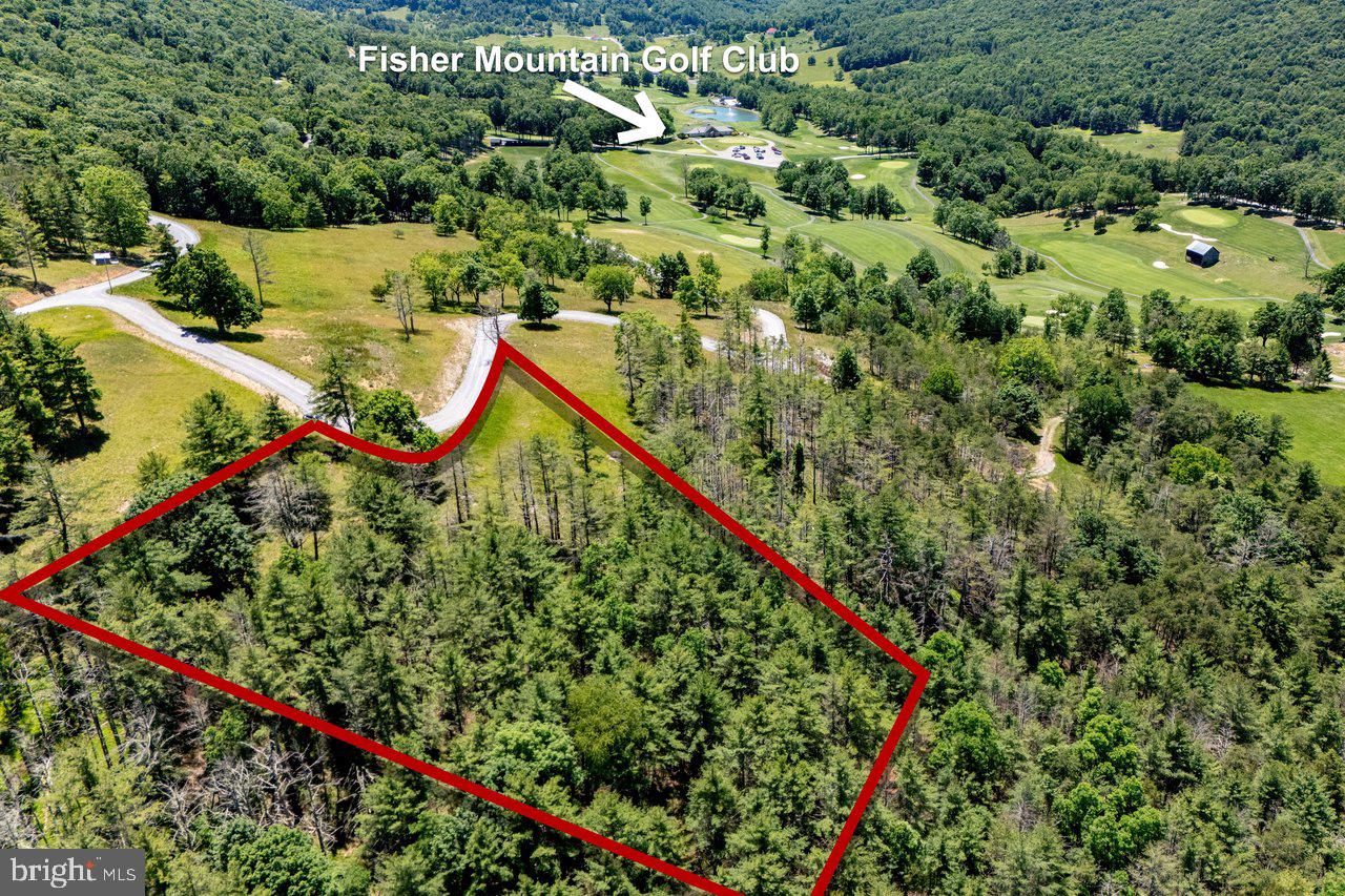 You will feel as though you have made it to Almost Heaven in this gorgeous setting at Fisher Mountain Golf Club. This 2.6 acre partly wooded lot is waiting for your dream home in a dreamy location near the golf course with access to the already established amenities and others coming in the future. The former Ancient Oak Kitchen will soon be opening under a new name and management offering delicious food. Enjoy Top Tracer driving range in addition the 18 hole golf course and miles of walking trails. Deer abound with many other forms of wildlife to observe from your future home and commute through the development.  Did I mention the lovely view of the setting sun? Come see for yourself!