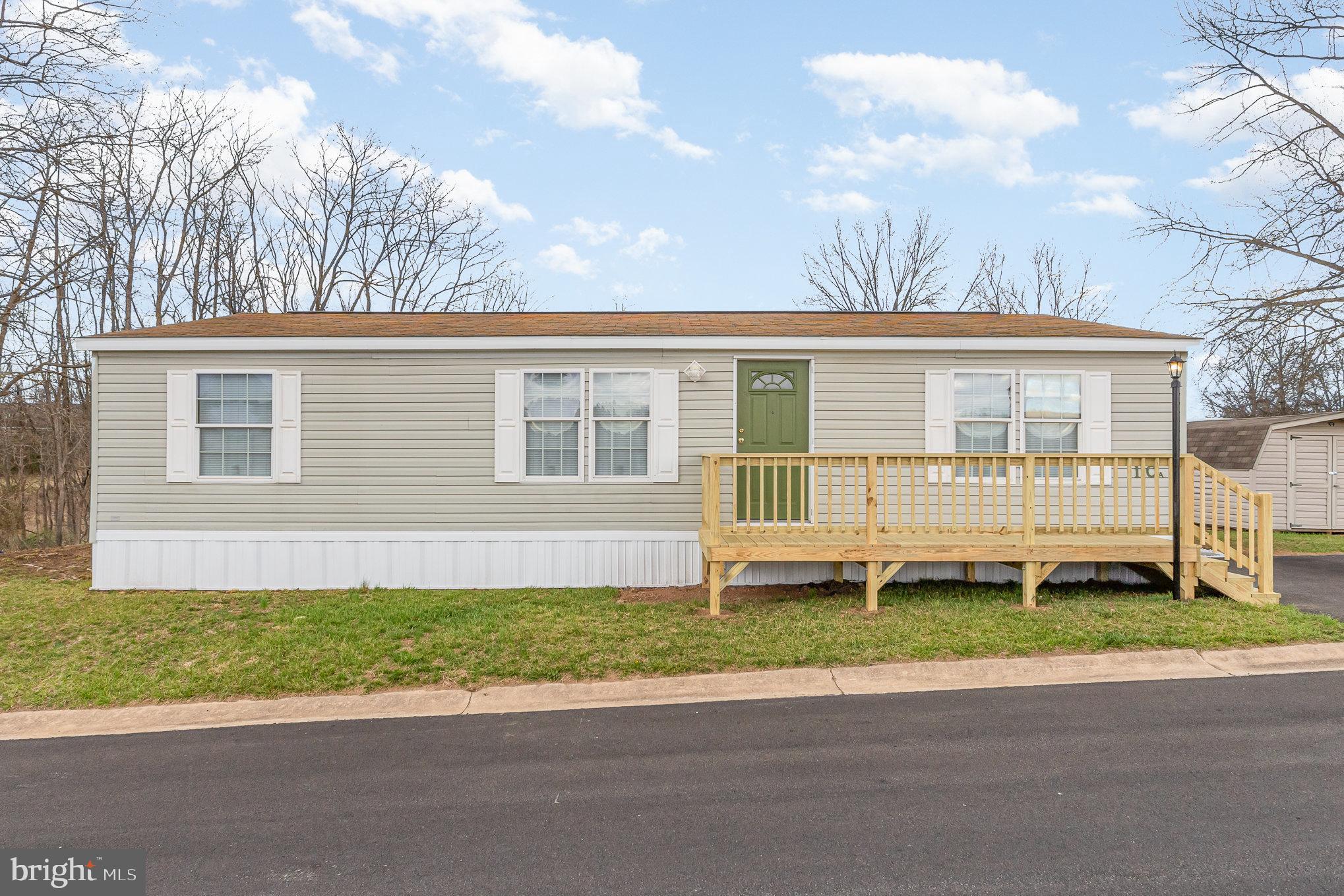 Enjoy this newly renovated home featuring all new flooring, new paint, new blinds, new toilets, light fixtures, new skirting, new decks and two full tanks of propane. All appliances stay. Home is located in the back corner of mature tree lined park to provide maximum privacy and unhindered views of the surrounding farm land.  Relax on the Amish built deck and watch the deer in the field while you view the sunset. Lot rent is $620 and includes water, sewer and common roads snow removal. Seller is a licensed Realtor.
