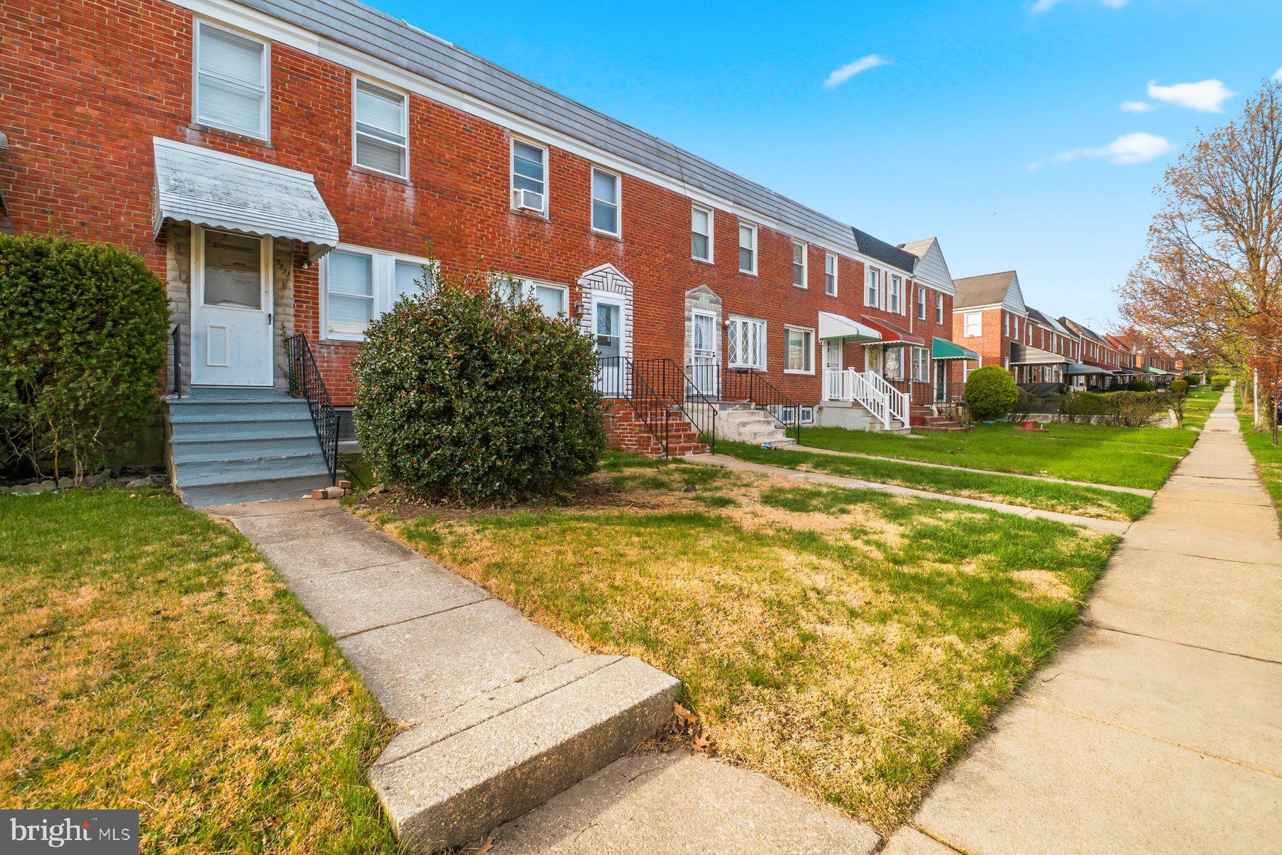 The perfect investment opportunity awaits you with this 2BR/1BA Townhome located on a quiet street in the heart of Belair-Edison.  This home features a spacious front yard, a fenced back yard with green space, and three floors of living space with a walk-out from the lower floor.  Imagine the possibilities this home offers including being close to shopping, restaurants, and commuter routes.