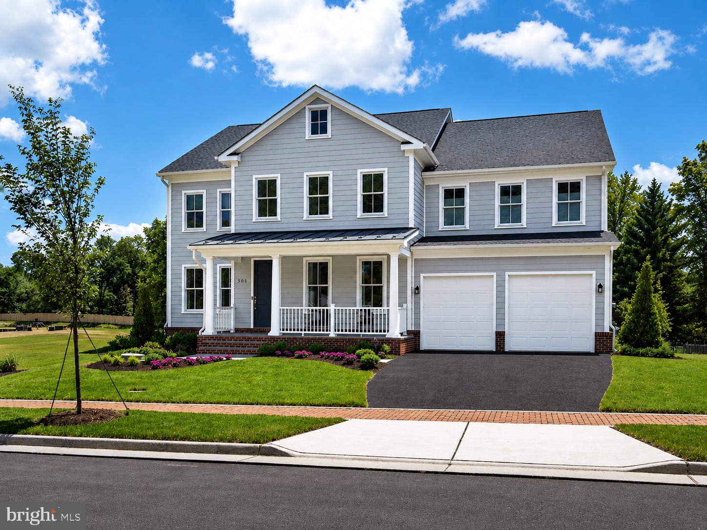 Morven Park Reserve is an exclusive collection of just 13 single-family homes built by award-winning Madison Homes, set along tree-lined Morven Park Road in the heart of historic Leesburg. Priced from the $1.7Ms, these generously scaled residences offer 4 to 6 bedrooms, 4.5 to 6.5 baths, and approximately 4,900 to 6,000 square feet across three finished levels. Each home features its own individually designed architectural elevation -- no two are alike -- with classic detailing approved by the Town of Leesburg Board of Architectural Review. Select homes include first-floor bedrooms and optional elevators.
Standard features are exceptional throughout. Interiors include 9-foot ceilings on all levels, prefinished hardwood on the entire main level, a vented linear gas fireplace in the family room, and a large mudroom with custom built-ins. Designer kitchens come equipped with a KitchenAid stainless steel appliance package including a 48-inch professional range, quartz countertops, painted shaker-style cabinetry with soft-close doors and drawers, and a spacious walk-in pantry. Owner's baths feature a freestanding Kohler soaking tub, oversized frameless shower with bench and niche, twin vanities, and quartz countertops throughout. The finished lower level includes a recreation room with rough-ins for a wet bar and full bath.
While exterior elevations are fixed by historic district approval, buyers have flexibility to personalize interiors -- with a wide array of options and upgrades available. Timing is key: acting early in the construction process maximizes customization opportunities.
Additional highlights include smart home pre-wiring, EV charger rough-in, Trex composite deck, and a Madison Homes industry-leading warranty program. Close to the 1,000-acre Morven Park estate, with miles of trails, formal gardens, and downtown Leesburg just minutes away. NOTE: Photos are of a similar model home and may show optional features, upgrades, or finishes that are not included in the base purchase price. Actual home and included features may vary.
