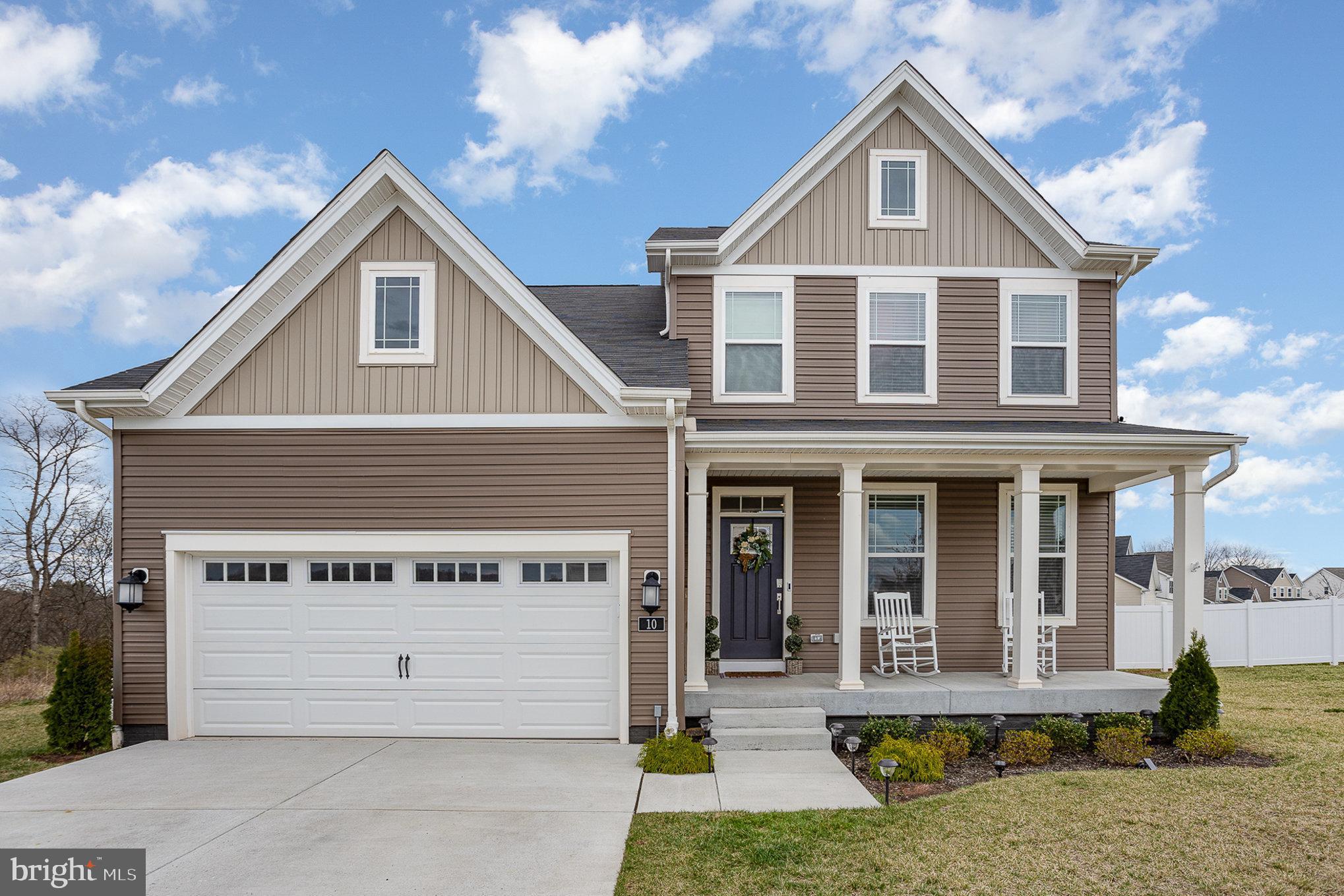 Welcome to this beautifully maintained two-story home, built in 2022 and located in the desirable Hickory Ridge Mews subdivision. This home offers the perfect blend of style, space, and functionality. Step inside to a bright bonus room—ideal as a home office, playroom, or second living area. From there, move seamlessly into the heart of the home, where an open-concept layout connects the kitchen, dining, and family rooms—perfect for both everyday living and entertaining.

The kitchen is designed with practicality in mind, featuring granite countertops, stainless steel appliances, and a large center island that adds both prep space and seating.

Upstairs, you'll find four generously sized bedrooms, including a spacious primary suite with a walk-in closet and private bath. An additional full bathroom and a convenient half bath on the main level ensure comfort for everyone.

Enjoy the outdoors in the expansive, fenced-in backyard complete with a low-maintenance composite deck—great for summer BBQs and quiet evenings alike. Additional features include a two-car garage, driveway parking, and an unfinished basement ready for your personal touch.

This 2022-built home in Hickory Ridge Mews combines modern comfort and convenience with room to grow—don’t miss your chance to make it yours!