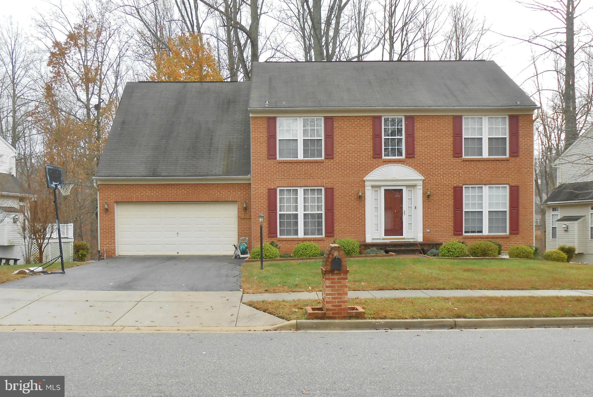 GORGEOUS COLONIAL WITH GLEAMING HARDWOOD FLOORS, COZY FIREPLACE AND OPEN 2 STORY FOYER.  EAT-IN KITCHEN AND SEPARATE DINING ROOM.  GREAT LOCATION---GOLF COURSE IN NEIGHBORHOOD.  ENJOY THE PRIVATE PAVED PATIO IN BACKYARD THAT BACKS TO WOODS.  MOVE-IN READY!!  SURVEILLANCE CAMERAS AT THE RESIDENCE.