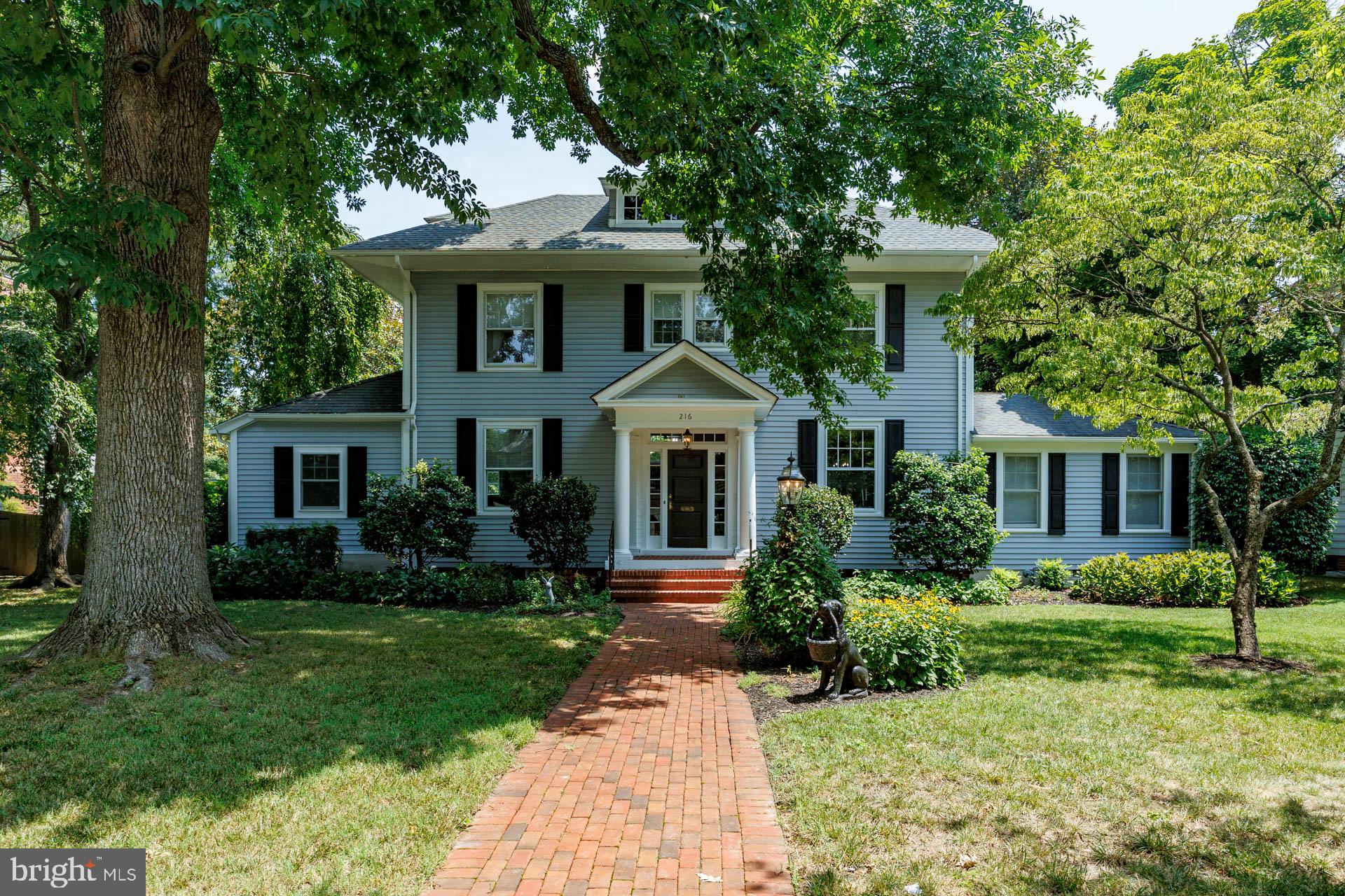 In-Town Living at its BEST! This classic center-hall Colonial is located in one of the most sought-after streets in downtown Easton. The house has been meticulously updated with hardwood-bamboo flooring throughout, a first floor primary bedroom, a separate office/den, living room with gas fireplace, large entertaining dining room, kitchen with new Stainless Steel appliances, quartz tops, three bedrooms and 2 baths on the second floor, all with generous living space, a third floor with a bedroom/full bath and sitting area. The house sits on a double lot (.40+/- acres), with towering oak trees in the front yard providing a beautiful canopy, a large composite deck in the backyard with beautiful landscaping and an incredible magnolia tree. There is alley access and an over-sized one car garage and workshop and a separate shed. A wonderful home in one of the Best Small Town’s in America.