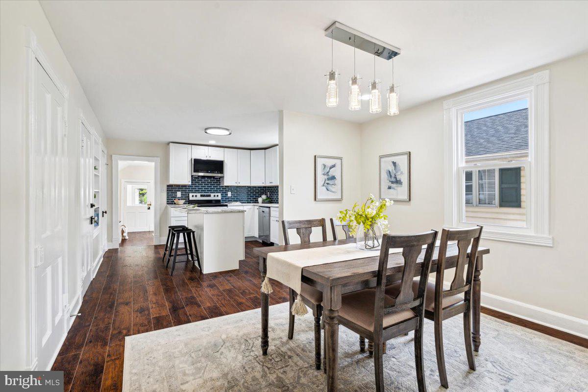 Motivated Seller!!  Price Improvement!!  All offers welcome! 

Welcome Home, to 825 Motter Avenue in Downtown Frederick.  Take a step inside to the main level, which features all new luxury vinyl plank flooring.  The main level of the home Boasts a Brand New Kitchen, Living Room, Formal Dining , Family Room and Laundry.   All with Fresh Paint, Trim and lighting fixtures.  The Kitchen is adorned with all new Cabinetry, Stainless Appliances, and Granite counter tops.  Exit the rear of the home from the Family Room, to the rear yard and parking pad of graded gravel.   Off of the Kitchen is a Foyer that leads to the Unfinished Mechanical space basement.  Also, a Half bath has been added to this level for convenience! Brand New Ductless Mini Split System for Heating and Air, on the main level.

From the Front Foyer, Walk up the Stairs to the Upper level.  All 3 Bedrooms are on this level and Two brand new full baths.  The Full bath off of the Primary Bedroom features a standup Shower.  Second Full Bath is Jack & Jill type between the other 2 bedrooms, with a full bath/tub.  Everything on this level is also brand new.  Luxury Vinyl Plank, Tile in Baths, Paint, Trim and not to mention it's very own Brand New Heat Pump HVAC just for this level.

What else comes with this home?  It's not just the inside that is newly renovated.  The Exterior boasts, new siding, new fixtures, New windows, ( with the exception of a few not needed) A darling front porch, fresh landscape and of course the parking pad in the rear alley of the home.  Heavy Up was done by First Energy to bring in 200 AMP service to the property.

The owners take Great Pride in the Craftsmanship of their Renovations.   Please come see for yourself, this tasteful and elegant renovation, right here, in Downtown Frederick!