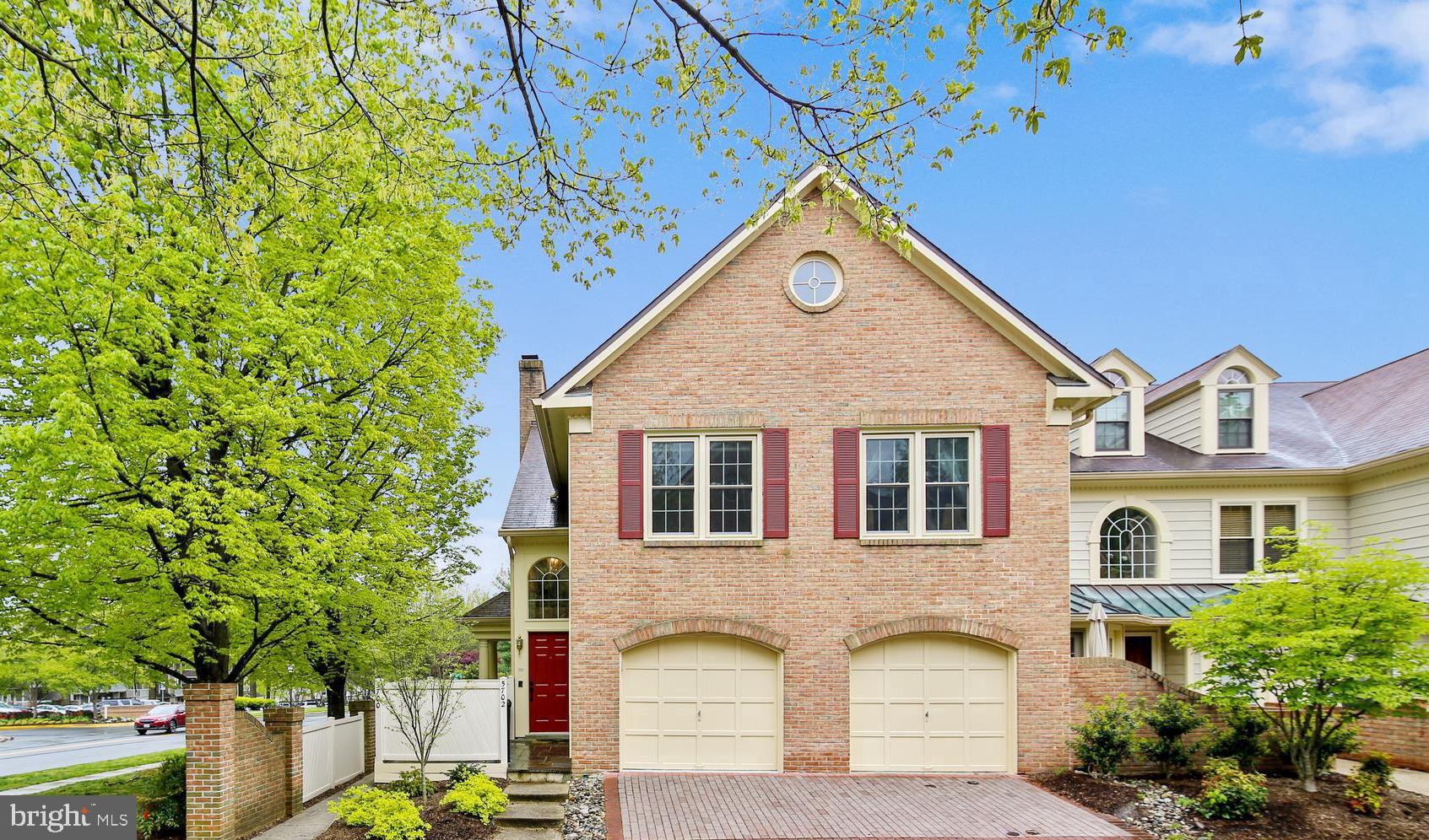 Fantastic, Sun-Filled, End-Unit Town Home at Luxberry Courts!  2BR/2BA, Large Den, Great Balcony with Dual Access, Vaulted Ceilings, Light-filled Spaces, Fireplace, 1 Car Garage, Renovated and very spacious eat-in Kitchen, Renovated Master Bathroom with separate shower and soaking tub, Hardwood Floors, Separate laundry room with full size washer & dryer, Guest parking, Great pet-friendly community with pool access next door!