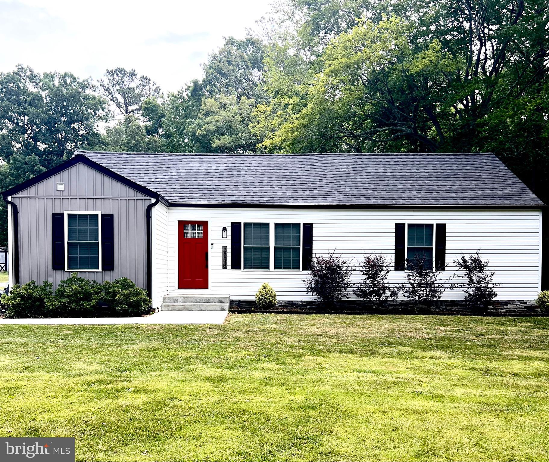 Step into this ONE level, completely renovated  home that was stripped down to the studs and everything was replaced from the roof to the floor, new well, and connected to public sewer in 2022.  Expand without having to worry about where the septic or septic reserve area is.  See and feel the craftsmanship that was put in with wood flooring, stainless appliances, sought after barn type door bedroom closets, Primary step in glass/tile shower, and tiled secondary bath.  This is like getting a brand new home at a secondary home price.  All of this so close to Leonardtown, the hospital, schools, and shopping.  See it today!