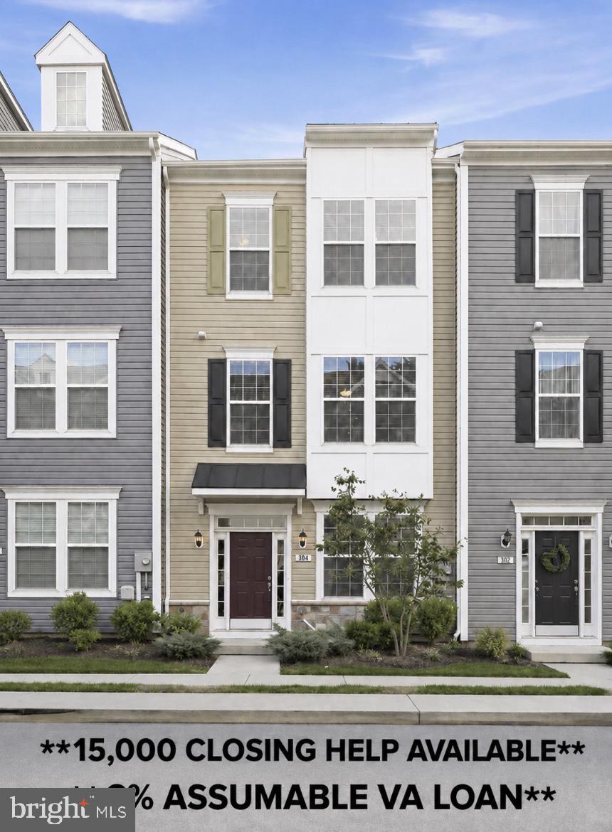 **Seller will pay up to $15,000 in closing costs**3% Assumable VA LOAN**Welcome to this stunning, light-filled contemporary townhome built in 2021 and located in the highly desirable Spring Bank community of Frederick. Offering over 2,000 square feet of beautifully finished living space, this spacious home features 4 bedrooms, 3.5 bathrooms, a 2-car rear-entry garage, and modern upgrades throughout.

The entry level includes a versatile bedroom or private home office with an adjacent full bath — perfect for guests, remote work, or additional living space. Upstairs, the open-concept main level showcases luxury vinyl plank flooring, oversized windows, and an impressive chef-inspired kitchen complete with an expansive center island, quartz countertops, espresso cabinetry, stainless steel appliances, gas cooking, pantry, and stylish designer lighting. The spacious living and dining areas flow seamlessly and are ideal for entertaining or everyday living.

Retreat to the upper level owner’s suite featuring tray ceilings, abundant natural light, a walk-in closet, and a spa-like bath with dual vanities and an oversized glass shower. Two additional bedrooms, a full hall bath, and convenient upper-level laundry complete the bedroom level.

Additional highlights include ceiling fans throughout, contemporary finishes, ample storage, and a generously sized garage with additional parking nearby. Conveniently located near Clemson Corner, Wegmans, Market Square, downtown Frederick, shopping, dining, parks, and major commuter routes. This exceptional home offers the perfect blend of style, comfort, and convenience in one of Frederick’s most sought-after communities.  Mortgage Balance appx $317k.  Some photos have been virtually staged.