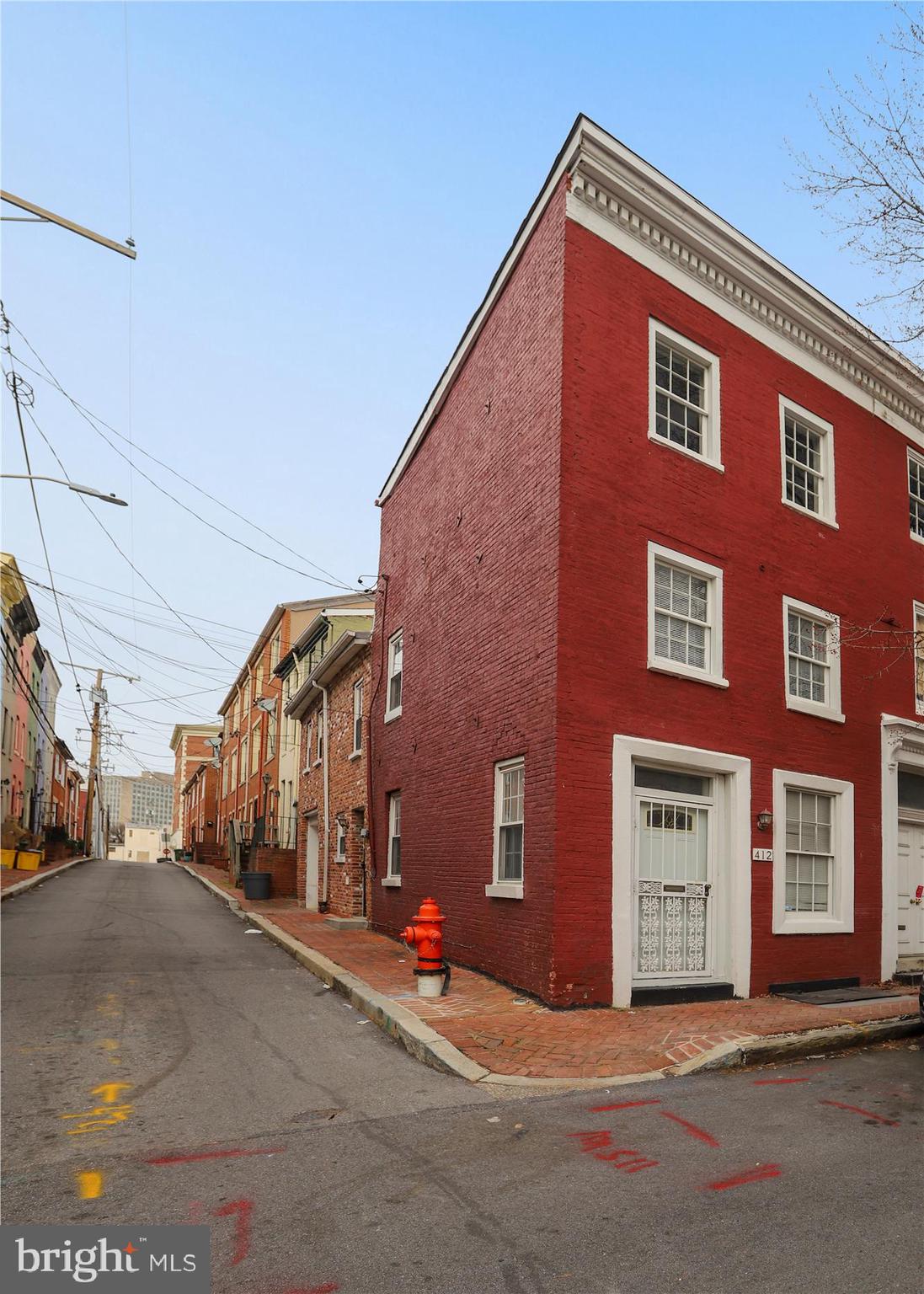 End Unit Historic Townhouse with Private Garage in Mount Vernon. Updated kitchen with stainless appliances, gas range, dishwasher and stackable washer/dryer. Hardwood floors in living room/dining room, end unit lets in lots of natural light. NEW CARPET TOO! Two large bedrooms on second floor with hall bath. Top floor features third bedroom and second full bath with shower. Good closet space and newer finishes throughout. Amazing location within 2 blocks to Mt Vernon marketplace, Howard St Dog Park and restaurants. 4 blocks to UMMC Midtown Campus. 6 blocks to The Washington Monument, Walters Art Museum and Mercy Medical Center. Easy access to Lexington Market Light Rail and Lexington Market Station, UMBC, Camden Yards, M&T Bank Stadium, Fells Point, Inner Harbor, Fort McHenry & UA Headquarters. Professionally managed. Don't miss this one!!
