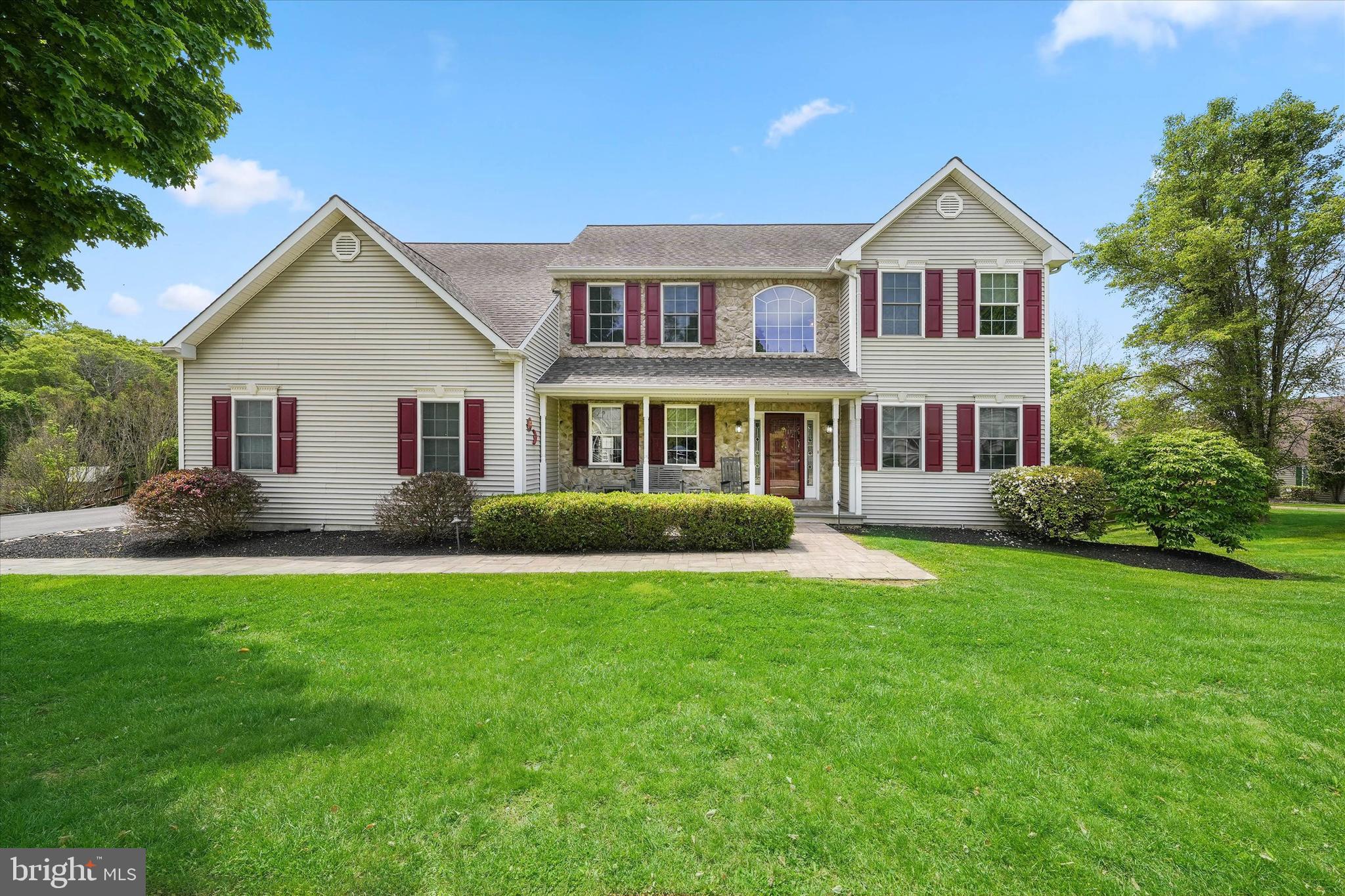 PRICE IMPROVEMENT! Welcome to 27 Twin Creeks Drive, a beautifully updated and well-maintained home in the highly desirable Mendenhall at Twin Creeks community within the award‑winning Garnet Valley School District. This spacious 5‑bedroom, 3 full bath, 2 half bath residence with a 2‑car turned garage sits on a premium corner lot and offers exceptional curb appeal, abundant living space, and an impressive oversized deck overlooking a private fenced backyard. Since 2019, the owners have completed extensive upgrades, including new hardscaping and path lighting, replacement HVAC systems, a whole-house Generac generator, some new flooring, kitchen renovations, basement drop ceiling, and the addition of a main‑floor laundry room with half bath. A newer paver walkway leads to the expanded covered front porch and into the impressive two‑story foyer with turned staircase and elegant wainscoting. The main level features a bright formal dining room with chair rail molding and a living room with French doors and ceiling fan. A private office—also with French doors—offers abundant natural light and an ideal work‑from‑home setup. The eat-in kitchen opens seamlessly to the great room and four‑season room, creating an ideal layout for everyday living and entertaining. Highlights include white cabinetry, granite countertops, herringbone backsplash, center island with breakfast bar, recessed and pendant lighting, stainless‑steel appliances, double sink, built‑in desk area, and two pantry closets. The adjoining great room features a gas fireplace with mantel and built‑ins, crown molding, chair rail, recessed lighting, and ceiling fan. The four‑season room features skylights, decorative windows, and access to the upper and lower teak decks—perfect for relaxing or hosting gatherings. A tucked‑away outdoor storage area sits beneath the four‑season room. Two powder rooms are conveniently located on the main level, including one adjacent to the office and great room, and a second combined with the laundry room. A bonus hallway with double closets leads to the attached 2‑car turned garage with built‑in cabinetry. Upstairs, a spacious landing leads to five generously sized bedrooms. The oversized primary suite includes a flexible sitting/dressing area, recessed lighting, ceiling fan, and two walk‑in closets. The ensuite bath features a soaking tub, separate shower, and double vanity. Four additional bedrooms offer large closets, and the hall bath includes a double vanity and tub/shower. A floored walk‑in attic provides excellent additional storage. The finished walk‑out basement expands the living space with areas for recreation, media, storage, a full bath, and a SECOND laundry room with wash basin. French sliders open to the backyard and custom paver walkway. Unique hidden storage areas are located throughout. Additional features include six‑panel doors, two staircases to the second floor, recessed lighting throughout much of the home, a new driveway, and extensive storage options inside and out. Ideally located near parks, restaurants, and shopping—including The Shoppes at Brinton Lake, Glen Eagle Square, and Wegmans—this home also offers easy access to Routes 1 and 202, I‑95, Philadelphia International Airport, Amtrak, and SEPTA, making commuting to Philadelphia, Wilmington, New York, and Washington, DC exceptionally convenient. A rare opportunity to own a beautifully updated home with flexible living spaces in one of Delaware County's most sought‑after communities—add 27 Twin Creeks Drive to your tour list today.