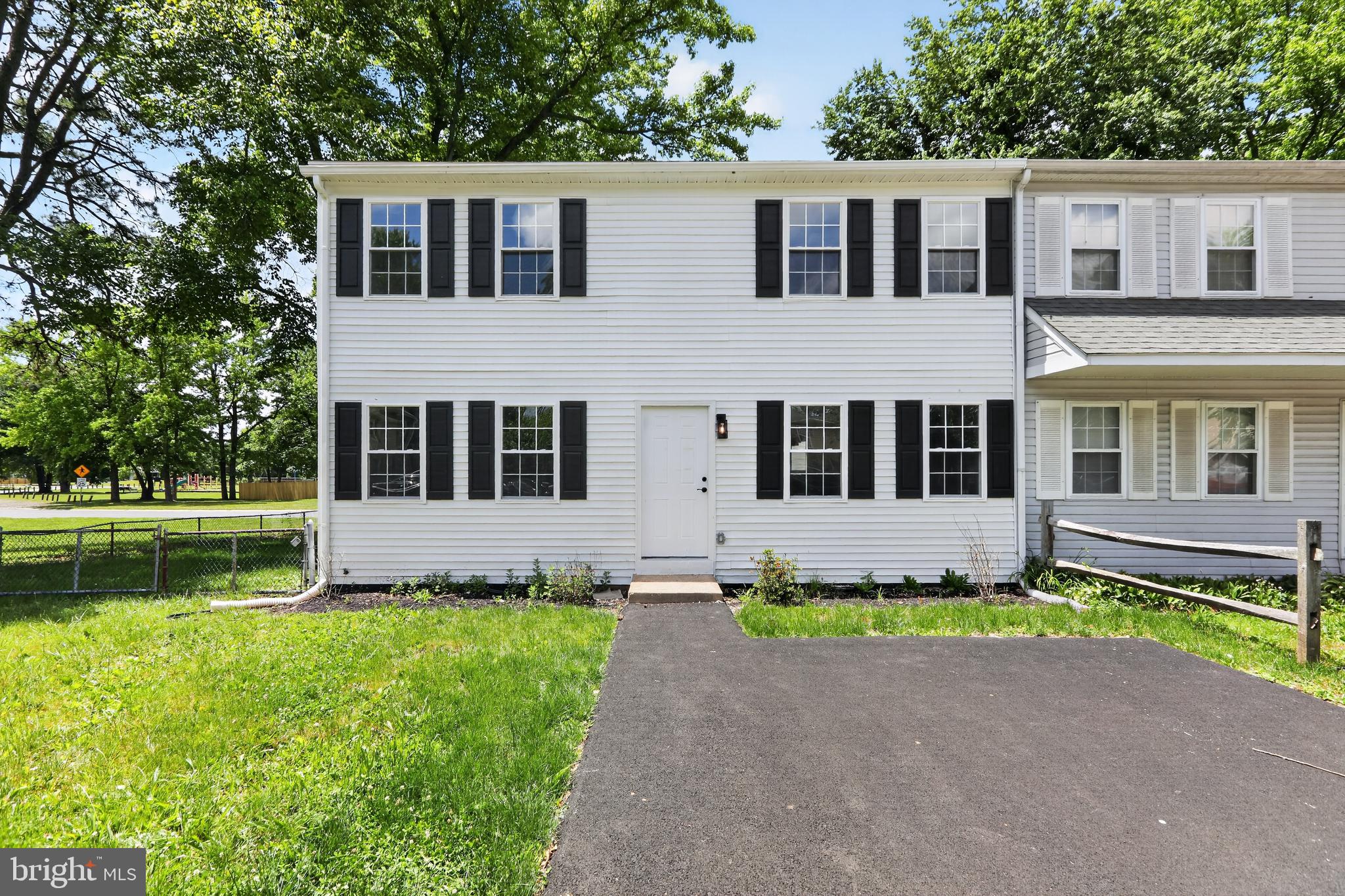 WOW... this is the one you've been waiting for! Welcome to an absolutely stunning, move-in-ready end-unit townhouse that truly has it all. This home offers a pure luxury look with finishes rarely found at this price point. Featuring 4 bedrooms, 1.5 bathrooms, every detail has been thoughtfully updated. Step inside and fall in love immediately. The main level boasts a welcoming foyer, spacious dining room, a beautifully renovated kitchen with breakfast area, inviting living room, convenient half bath, and laundry room. Upstairs, you'll find four generously sized bedrooms and a fully updated full bathroom. Outside, enjoy a large backyard, a nicely sized driveway, and excellent curb appeal that sets this home apart. Major upgrades include a brand-new kitchen, new bathrooms, new flooring, new doors, new roof, upgraded HVAC, new driveway, and so much more. Finding a home of this size, condition, location, and price is truly rare. This one will not last.