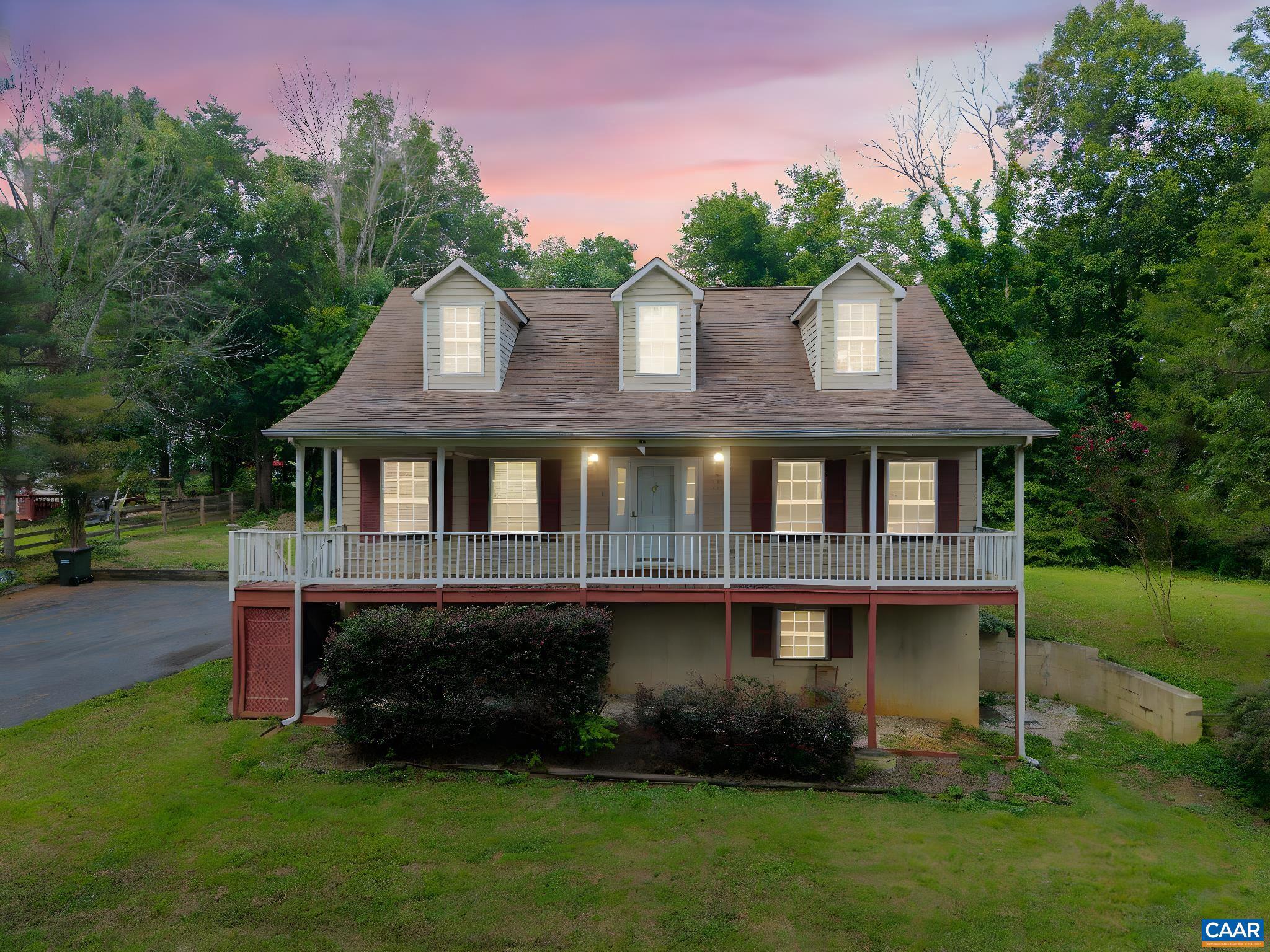 Here's your Lake House!  This 3 bedroom home sits across from the lake and beach!  The expanded front porch offers plenty of room for "front porch sitting".  There is an unfinished walk-out basement with a bathroom rough-in that can be finished to double your living space, or use as a rental investment! The large living room with a fireplace flows into the spacious kitchen.  This home is only about a mile off of Route 33 offering a quick trip for shopping, schools, or a scenic ride to Shenandoah National Park.  This home has been freshly painted inside and new carpets upstairs, along with new ceiling fans. Call for your private showing today!,Wood Cabinets,Fireplace in Living Room