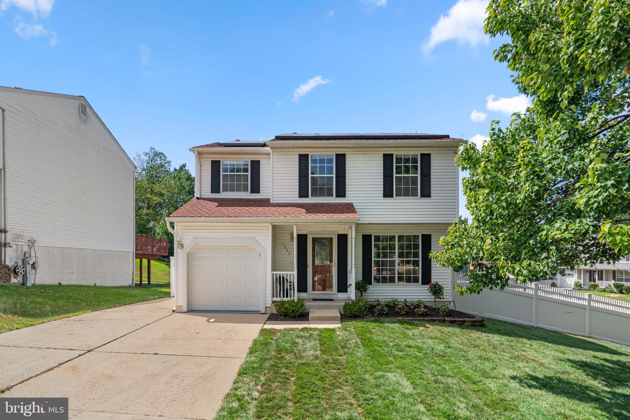 Beautifully renovated corner-lot single-family residence offering 4 bedrooms, 2.5 bathrooms, and 2,973 square feet in desirable Sandridge. A charming front porch welcomes you inside, where newly refinished hardwood floors flow throughout the main level. The foyer features a convenient coat closet and direct access to the attached 1-car garage. To the right, the traditional floor plan opens into a spacious, sunlit living room that seamlessly transitions into the formal dining room, creating an ideal setting for both everyday living and entertaining. Adjacent to the dining room is a cozy breakfast area and the stunning eat-in kitchen, showcasing vaulted ceilings, a center island with breakfast bar seating, pendant lighting, a custom backsplash, stainless steel appliances, abundant cabinetry, and generous counter space. Open to the kitchen is the impressive family room, enhanced by newly installed carpeting, soaring vaulted ceilings, a fireplace, and multiple access points to the outdoors. A unique stone-accented wet bar with a sink, shelving, and Palladian windows adds character and functionality to the space. A convenient powder room completes the main level. The upper level is highlighted by the spacious owner's suite, featuring a walk-in closet with a custom organization system, a private balcony, and an attached bathroom with dual vanities. Three additional bedrooms and a second full bathroom provide comfortable accommodations for family and guests. The lower level offers a blank canvas for future customization and includes the laundry area, presenting endless possibilities for additional living space, recreation, storage, or hobbies. Outdoor living is equally inviting with a wraparound deck overlooking the fully fenced backyard. Professional landscaping enhances the property, including newly installed sod in the front yard in June 2026. Additional highlights include rooftop solar panels, providing energy efficiency and potential long-term utility savings.
