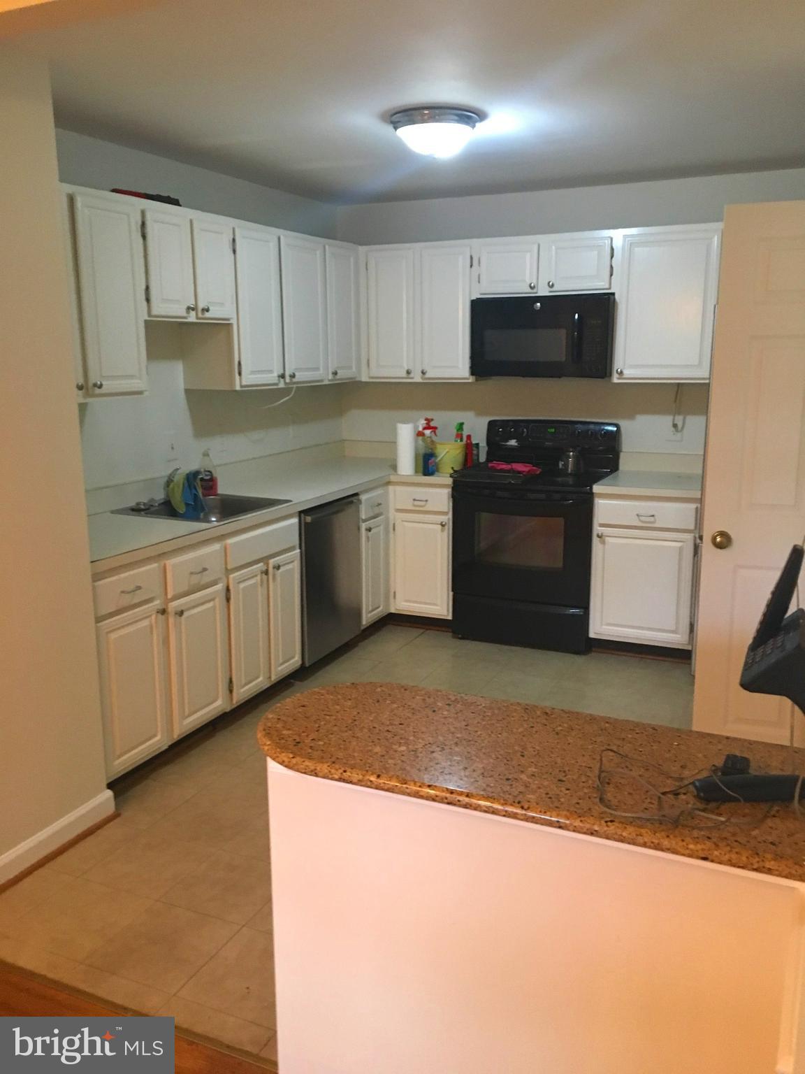 Nice large townhouse in N Bethesda ready to move in.... Three generous bedrooms up w hardwood floors and lots of closet space. Main lvl has table space kitchen, dining room, living room and office with built in shelving as well as half bath. Pellet stove in basement heats whole house and for less in the winter. Convenient location!!