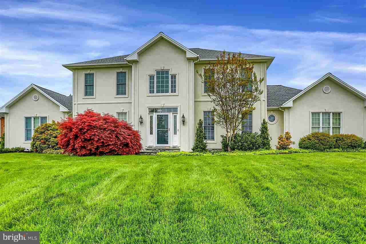 Great home w/entertaining at a premium. 2-story foyer w/marble floor. Open and airy floor plan, must see 1st floor master ste, luxurious bathroom w/dbl vanity, Jacuzzi tub & gas fireplace. EIK w/bfast bar and SS appl. Liv & DR w/tile floors & crown molding. 2-story sunken fam rm w/inlaid hw floors & gas fp. 3 add'l bedrooms on 2nd floor. 3-car over-sized garage. Huge LL rec room & the perfect back yard for summer fun. Less than 1 mile from I-83.