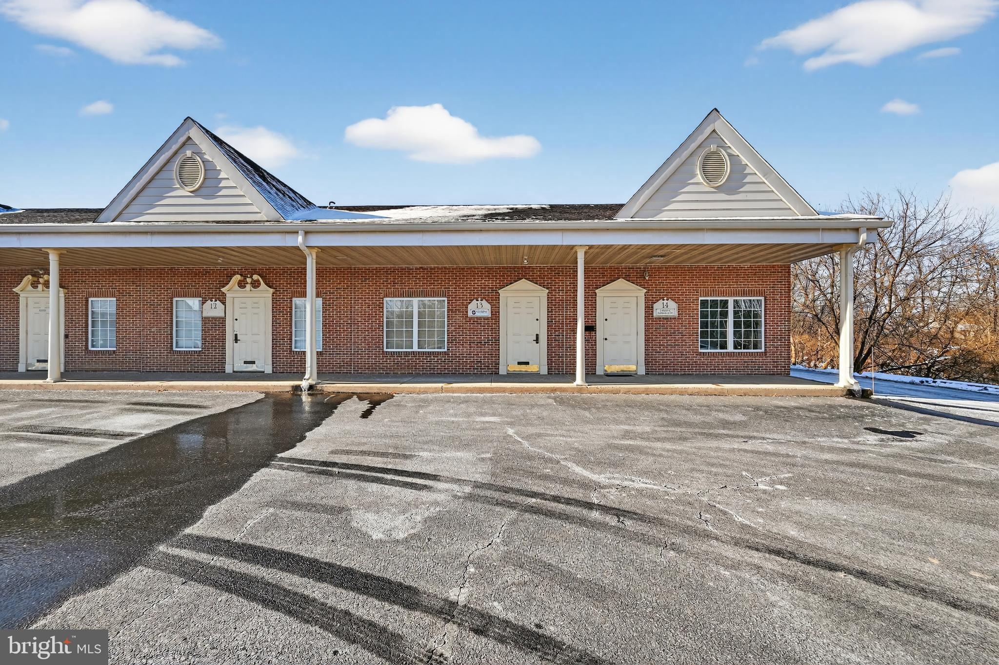 New reduced price! Welcome to 1829 New Holland Rd Suite 13 in the prestigious Kenhorst Village Professional Center!! This Commercial Condominium is a great business opportunity featuring approximately 1,000 square feet of versatile workspace. The spacious layout currently has 5 offices and provides ample room for a variety of professional uses, with clean new flooring, neutral tones, and modern decor creating a bright, functional environment. The well-maintained exterior and ample parking ensure a professional and accessible setting. The interior boasts abundant natural light through large windows, contributing to a well-lit and organized workspace. The bathroom is spacious, and the overall layout is designed to be efficient and accommodating. This property offers great space, in a convenient location in the booming city of Reading Pa, suitable for a range of business endeavors, from a lawyer's office, real estate office, tax specialist, insurance office, accountant, mortgage office, or any other professional office you can think of. There is potential for any sort of small medical doctors' office as well, as some of the units in the center have been used for these professions as well!! The condo association fee is 270 dollars a month and the association payment includes water and sewer bills. There is Central A/C which is electrically based and the heating is forced air, which is natural gas-based. If you are interested or have any questions about this great opportunity, please feel free to reach out to the listing agent! Also, make sure to take a look at the virtual video tour!!