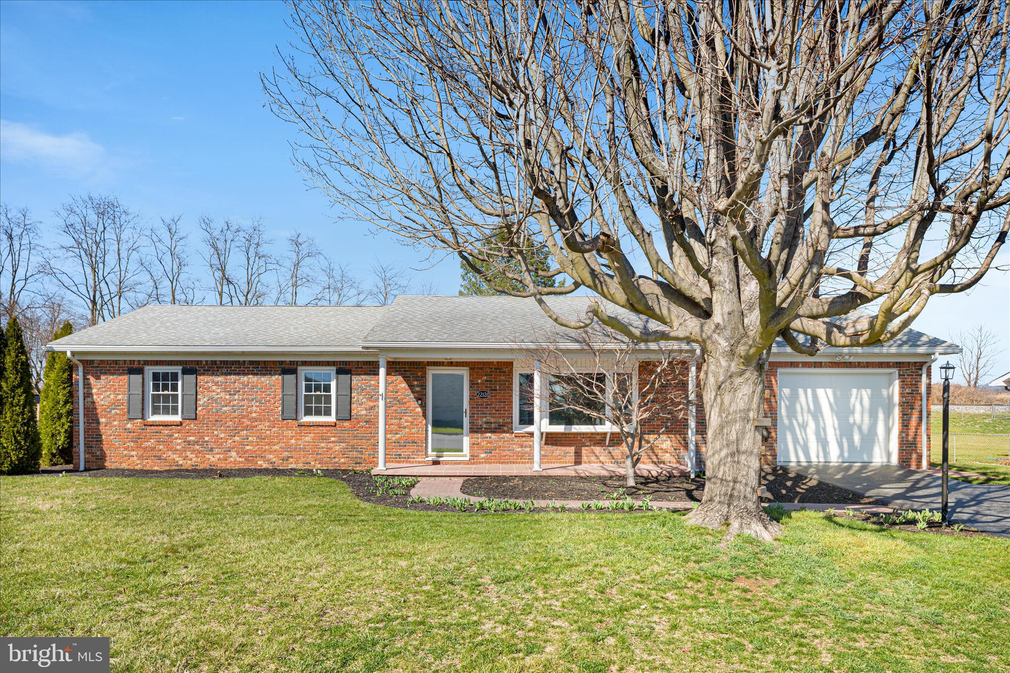 Welcome to 22120 Holiday Dr! This charming 3 Bed 2 Bath all-brick rancher features hardwood floors in common areas, carpet in all bedrooms, a fully finished basement with a 60,000 BTU wood stove fireplace, and a large concrete patio with a 400 sq ft covered section already on footers — ready to be converted into a sunroom if desired. Fully fenced backyard with no rear neighbors. No HOA. Major updates include the HVAC air handler and ductwork (2020), roof (2017), water heater (2024), and refrigerator (2026). Ideally located close to major commuter routes. This home won't last long, schedule your private tour today!