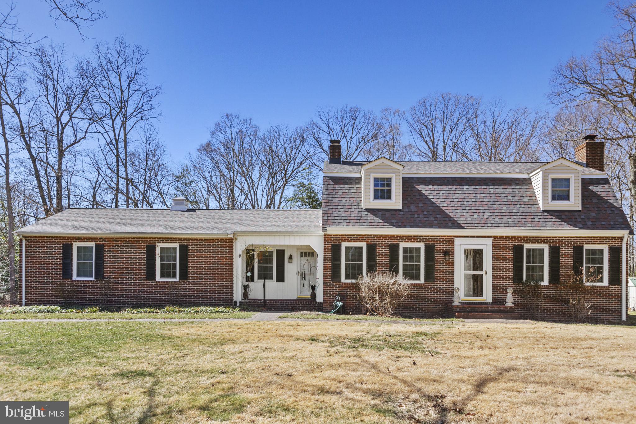 This beautiful home welcomes you with warmth and charm as you step through the front door. Hardwood floors flow throughout, complemented by a cozy fireplace and elegant details like fresh paint, crown molding, and chair rail accents.  The kitchen is a chef's dream with a farm sink, granite countertops, stainless steel appliances, and timeless custom tile work. A large, custom-built pantry with a coffee bar and an island offering tons of storage make it both functional and stylish. Adjacent to the kitchen is a versatile bonus room, ideal for a breakfast nook or sitting area, featuring a wood-burning fireplace. The spacious dining room is perfect for hosting with ample room for eight people. The home also offers a well-organized mudroom and laundry room, though the wood shelving units and baskets do not convey. In the basement, you'll find plenty of space for entertaining, or even a workbench, and tons of storage.
Upstairs, you’ll find three bedrooms and two full baths, all with hardwood floors. The master suite is a peaceful retreat, featuring a spacious bedroom, large walk-in closet, and a master bath with heated floors and double sinks.
For added versatility, the home includes an in-law apartment with its own entrance. The apartment features a living room, kitchen, bedroom with walk-in closet, and a bathroom, providing a perfect private space for guests or potential rental income

Outside, the spacious backyard is every homeowner's dream with two beautiful patios and a gazebo—ideal for cookouts, bonfires, gatherings and entertainment. Set on 1.89 acres, this corner lot offers plenty of room to roam and enjoy the outdoors.

This meticulously maintained home boasts numerous recent upgrades that offer both comfort and functionality. Situated on a beautifully landscaped lot, this property features:

Roof, Sump Pump, and Dehumidifier Replaced in 2024 for peace of mind and efficiency.
Freshly Painted Downstairs Level (2024), providing a modern and inviting atmosphere.
Upstairs Hardwood Floors Installed in 2023, adding warmth and elegance to the living spaces.
A/C Unit Replaced in 2021 for optimal climate control year-round. 
This home features a well-maintained septic system, last pumped in 2023.
A freshly repaved driveway completed in 2024, ensuring convenience and longevity for the new owners. Water Softener (2019), Kitchen Renovation (2019), and Master Bath Renovation (2020), offering a blend of style and practicality.

The exterior is equally impresimpressive, with:
10' x 14' Utility Shed perfect for storage or workspace.
5 Cords of Firewood to supply the two fireplaces, creating a cozy retreat for chilly nights.
Husqvarna Riding Mower with a cart, ideal for maintaining the yard or riding along the private walking trail through the wooded section of the property.
Additionally, monthly lawn care service is provided by MRW Lawn Service, ensuring your outdoor space stays pristine year-round.

This home is perfect for those who appreciate quality, convenience, and nature, all in one place. Don’t miss the opportunity to make this beautiful property your own!