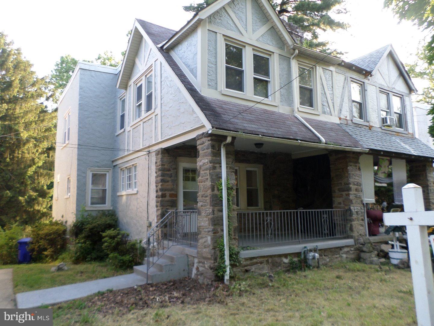 Gorgeous Stone Tudor Twin In Cheltenham School District.  An Always Desired Elkins Park Address Just Steps To Philadelphia.  This Home Backs To Scenic Tookany Creek With Unrivaled Creek Views.  Deep Front Lawn & Open Porch Provide Great Curb Appeal.  Absolute Move-In Ready !  The Interior Features Gorgeous Refinished Hardwood Floors With An Incredible Polished Glass Sheen.  Front Steel Entry Door.  Stone Fireplace In The living Room For A Comfy Ambiance.  Classic Hardwood Staircase.  Formal Dining Room With Chair Rail Moulding.  Updated Kitchen Features Tile Floor & Backsplash, Stainless Steel Sink, Gas Cooking.  Covered Balcony Just Off Kitchen.  The Second Floor Includes Three Generous Sized Bedrooms With Extra Closet Space, Two Ceiling Fans.  Designer Bathroom Updated With Exceptional Tilework, Upscale Fixtures.  Full Basement With Security Conscious Steel Door To Rear.  Economical Gas Radiator Heat.  Attached One Car Garage Plus Deep Driveway.  Freshly Painted In Neutral Hues.  Vinyl Replacement Windows. A True Value Priced Property.   Appreciate The Stream And Recreational Park Like Setting In Your Backyard !