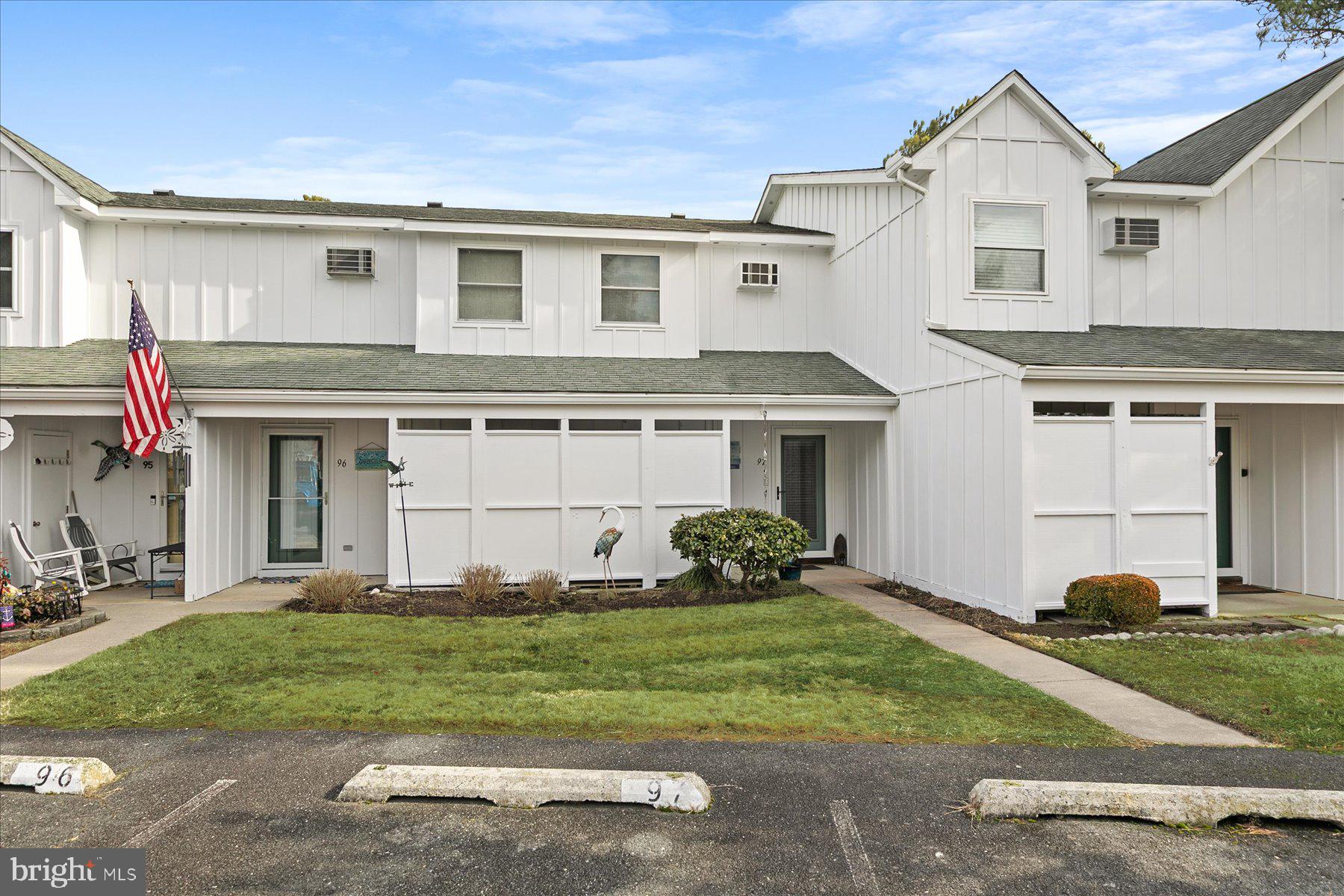Beautifully renovated pond-front coastal retreat located just 2 miles from the beach in Fenwick Island. Enjoy peaceful water views from your screened porch — the ideal spot for morning coffee or evening sunsets. Inside, the home has been thoughtfully updated with new wood flooring throughout the first floor, new carpeting in both bedrooms, and fresh paint throughout. The fully remodeled upstairs bath adds a modern touch, while the wood-burning fireplace creates a cozy gathering space year-round. Offered fully furnished as shown, including artwork, this home is truly move-in ready. Nestled in the community of Mallard Lakes and offering easy, low-maintenance living, the HOA covers lawn care, exterior maintenance, and flood insurance. Residents enjoy resort-style amenities including two pools, a hot tub, lighted tennis and pickleball courts, volleyball and basketball courts, shuffleboard, fishing piers, grilling and picnic areas, and a playground. Just minutes from dining, nightlife, shopping, golf, boating, and outdoor entertainment venues like the Freeman Stage, this waterfront townhome combines relaxation, convenience, and coastal charm.