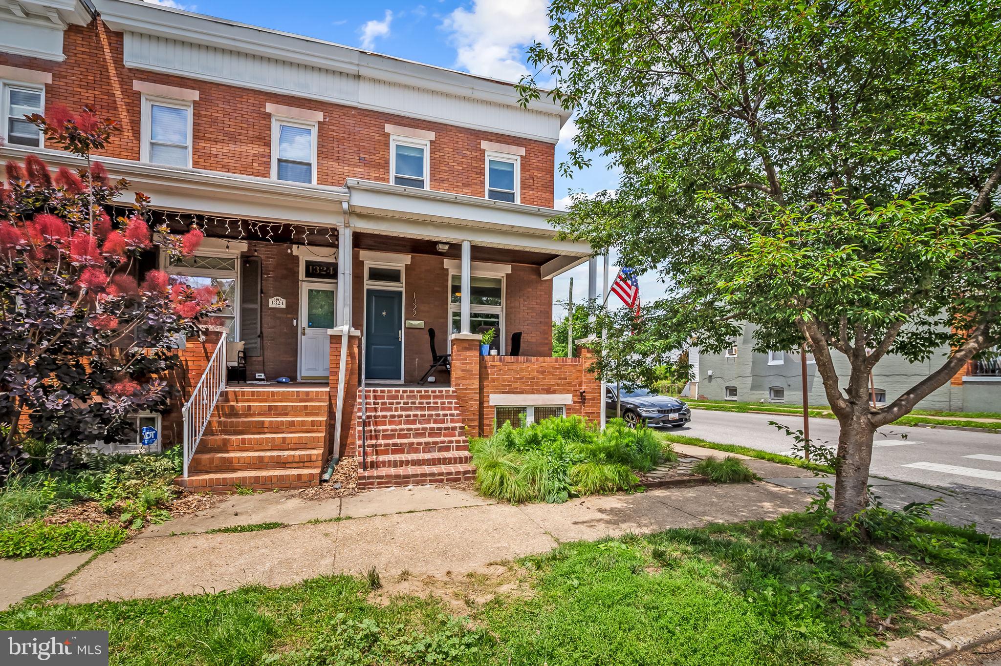 Wonderful porch-front, end of group rowhome on beautiful and quiet tree lined street. Open concept floor plan on 1st floor with large living room with exposed brick, and plenty of natural light. Main level features a  lovely kitchen with granite countertops, island with breakfast bar, and stainless steel appliances.  Main level bathroom  as well. Upstairs are 3 nice sized bedrooms and hall bath.   Lower level is unfinished but could easily be renovated for additional space. Waterproofing has been completed and basement has 8 foot+ ceiling height, 800 square feet of future space for all your hobbies or finish for a lower level entertaining zone.   Additional features include central A/C, Replacement windows, rear fenced yard and more!  Great location, close to restaurants, shopping,  easy access to 83 , and Medfield elementary school.