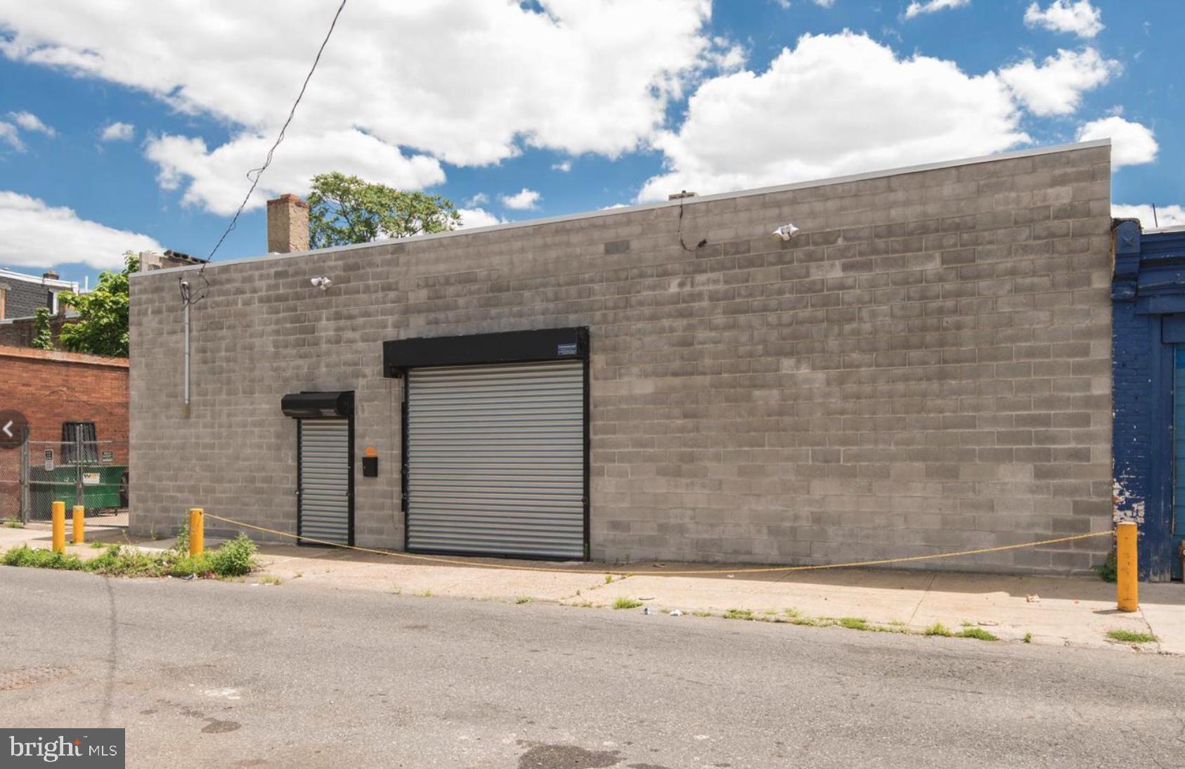 5,600 SF CMX-2 single-story warehouse is now available just off the busy intersection of Broad Street and Hunting Park Avenue, ideally situated behind a high-traffic retail strip center. This turn-key space features drive-in doors,  newer roof with 16” on-center joists, two bathrooms, office space, mini-split HVAC systems,  electric and plumbing. Located within a Great Qualified Opportunity Zone (QOZ), the property offers excellent potential for a variety of commercial uses. Zoning and permitted use to be verified by the buyer. 
For SALE AS-IS.