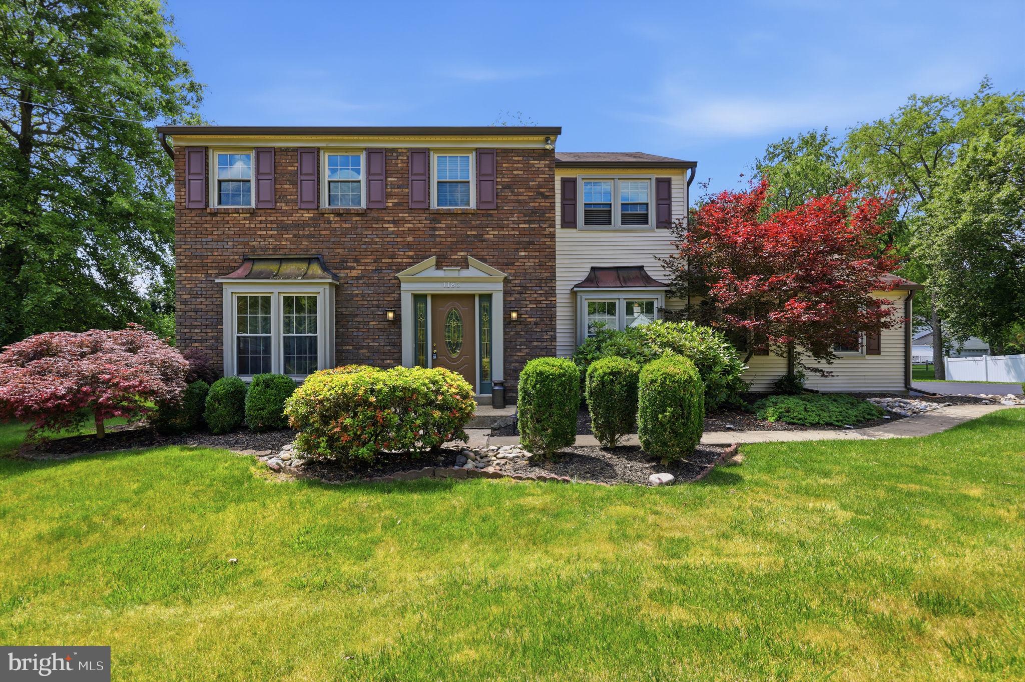 Welcome to your dream home in the prestigious Huntington Valley! This stately brick-front colonial offers timeless elegance and modern amenities for discerning homeowners. As you step through the grand entrance, you'll be greeted by a foyer adorned with gleaming hardwood floors, wainscoting, and crown molding, setting the tone for the sophistication that awaits within. The elegant staircase adds a touch of grandeur, guiding you to the heart of the home. The upgraded kitchen is a chef's delight, featuring a spacious breakfast room, granite countertops, a ceramic backsplash, and stainless steel appliances. Whether you're preparing a casual meal or hosting a dinner party, this kitchen is the perfect space to unleash your culinary creativity. Relax and unwind in the inviting family room, boasting a brick-raised hearth fireplace and beam ceilings. The room seamlessly opens to a stunning rear two-tier deck, providing the ideal backdrop for outdoor entertaining or simply enjoying the serene surroundings. The formal dining room exudes charm with its gleaming hardwood floors and beautiful custom moldings, creating an inviting atmosphere for memorable gatherings. The living room, also adorned with crown moldings, offers a cozy retreat for relaxation. For added convenience, a large laundry room and mudroom are located on the main level, ensuring that daily tasks are a breeze. Upstairs, the primary suite is a true sanctuary, featuring a spacious walk-in closet and a private bath. Three additional nicely sized bedrooms and a hall bath provide ample space for family and guests. The unfinished basement offers endless possibilities for customization, whether you envision a home gym, media room, or additional storage space. Outside, the expansive rear two-tier deck is a true entertainer's paradise, with half of it covered for shade and the other half open to soak up the sun. Don't miss the opportunity to make this exceptional property your forever home. Schedule a showing today and experience the perfect blend of luxury, comfort, and functionality that awaits you in Huntington Valley!