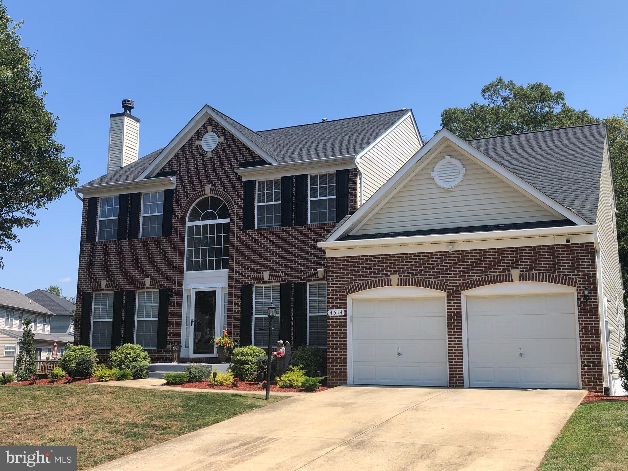 If this house could sing and dance - it'd 'bust a move' and shout  - COME ON IN!  I'M MOVE-IN-READY!  ​ Featuring 4400+ square feet, this immaculate 5-bedroom​,​ 4​- full​ bath​, 2-car garage​ brick-front Colonial home is located in  the s​ought after Kingsview community.  (Potential 6th BEDROOM/office/playroom in the fully finished basement!)   MAIN LEVEL 1st FLOOR 5th BEDROM with an attached FULL  BATH is  perfect for overnight guests!  Roof replaced in 2020 - just over 1 year old!  Recently serviced Back-up Generator!  Recently serviced HVAC systems! Two AC Units!  Relax ​in the spacious living room while admiring all the hardwood flooring throughout entire home  - because who needs carpet, right?!  ​While others are breaking a sweat fixing, patching​, and painting​ a fixer upper...you can simply chill and enjoy a classic movie or the latest Netflix show in the basement theater room​. Or sit outside ​beneath the deck and enjoy the ​brand new brick paver patio​! Or​ simply relax​ by the fire pit ​​ in the backyard​ on ​patio #2!  When the sun sets, just turn on the lights nestled on the backyard tree!​  Electrical outlets set up in backyard near firepit​ ​ ​​​ ​Upgraded​ modern stainless kitchen appliances​ and granite counters w/matching back splash​! ​Center island with ​bar seating!  Eat-in kitchen table space with glass slider door to the outside deck. ​ ​2-story foyer with Palladian window - for natural lighting! ​ Separate formal dining​ room.  Living room with wood burning fireplace.  ​Primary​ bedroom with sitting room and ​huge ​long ​walk-in closet​.  Attached primary bath with​ ​separate ​vanities​​​/sinks, soaking tub and newly tile​d​ ​separate ​shower.  All new hardwood ​floors ​in the upper level and stairs leading to upper level.  New tile flooring in laundry/mud room.  Ceiling fans throughout, some with remote controls. ​ Oversized garage!  ​Brand new ​front ​storm door! ​Newly stained deck with solar lighting​.  Finished basement with tile flooring, full bath, separate ​exercise ​area​ with glass mirrors & recessed lighting​, recreation​ room​/sitting  area, ​newly installed barn/sliding door and  entertainment area large enough for a bar/game table/pool table.  Separate ​theatre ​room ​(​or ​use as ​6th bedroom​, office or playroom). ​ ​Wide walk -up ​​steps from basement ​leads ​to​ a fully fenced ​rear ​backyard​ that backs to trees offering a wooded view​ and privacy.  Extensive hardscaping and landscaping for great curb appeal! Oversized ​backyard ​shed with ​shelving, electrical/flood light​s​.​ ​Potential 100% Financing/USDA Rural Development.  ​Community offers a swimming pool, club/pool house, tennis courts, walking paths, gazebos and tot lots/playgrounds.  Easy commute to park and ride, military installations, Indian Head Walking/Jogging/Biking Trails, MGM National Harbor and more!  Schedule a tour today before someone else scoops it away! (Please follow Covid-19 health and safety protocols. Face coverings/masks required upon entry when touring home.)