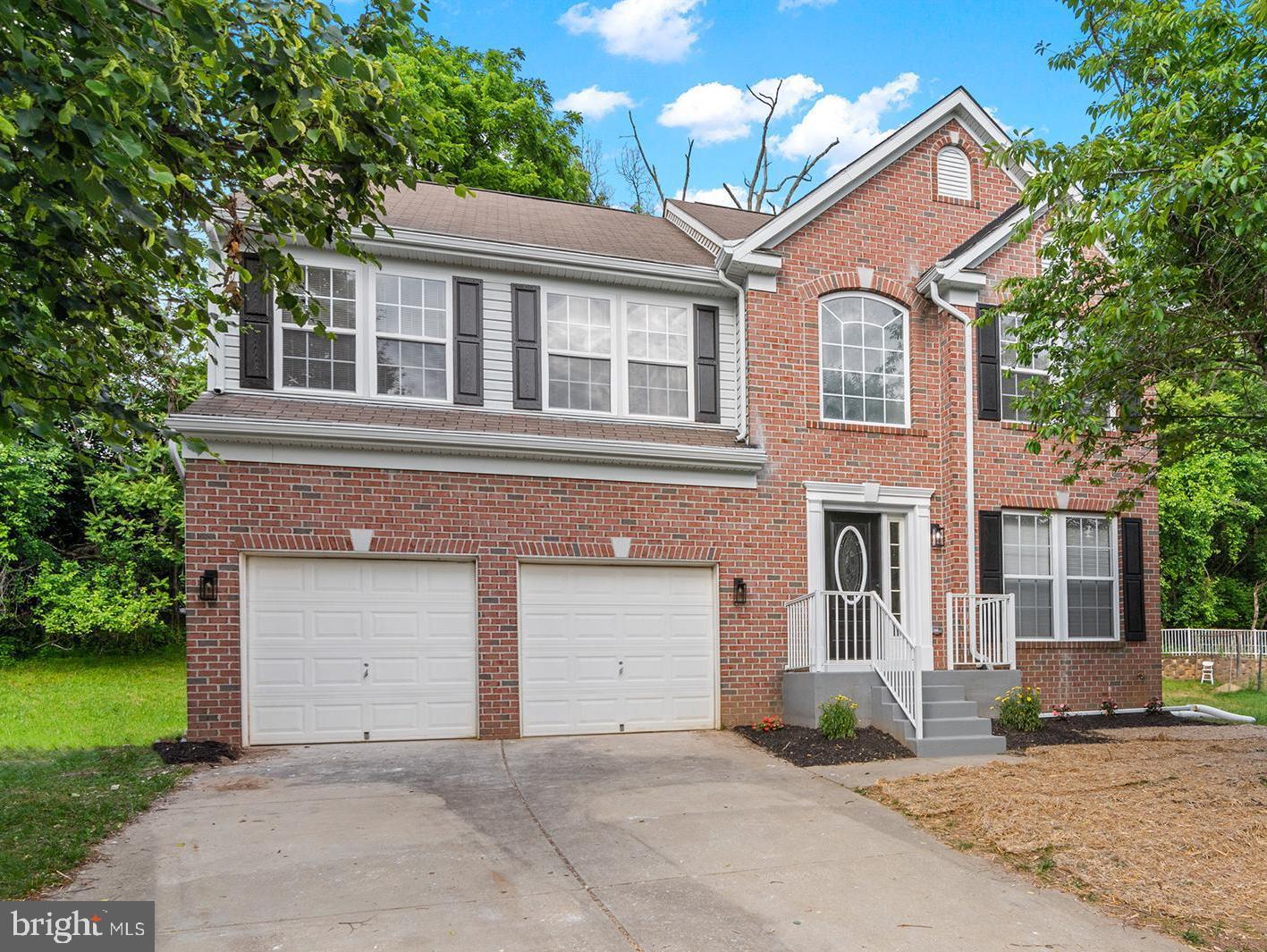 Welcome to 5 Freshman Court, a stunning fully renovated 5-bedroom, 3.5-bath Colonial located on a quiet cul-de-sac in desirable Reisterstown. Thoughtfully redesigned from top to bottom, this exceptional home showcases custom craftsmanship, luxury finishes, and modern functionality throughout.

From the moment you enter, you'll be impressed by the custom trim details and elegant box moldings that continue up the staircase and throughout the upper-level hallway, creating a grand and sophisticated feel.

The centerpiece of the home is the gourmet chef's kitchen, featuring quartz countertops, a dramatic waterfall island, built-in microwave, gas range with custom hood, and abundant cabinetry on both sides of the oversized island. Designed for both entertaining and everyday living, the kitchen also includes two sinks, including a prep sink conveniently located in the island.

The spacious family room features custom moldings, a built-in entertainment wall, and seamless flow throughout the main level. A stylish powder room completes the first floor.

Just off the main living area, enjoy the beautiful all-season screened sunroom complete with ceiling fan, offering the perfect space to relax, entertain, or enjoy morning coffee while overlooking the backyard.

Upstairs, the luxurious owner's suite serves as a private retreat featuring custom LED accent lighting integrated into the crown molding, a walk-in closet, and a spa-inspired bathroom with dual vanities and a stunning frameless glass shower featuring four shower heads, a multi-function spray system, and designer finishes throughout.

The well-appointed laundry room offers custom cabinetry, built-in shelving, a utility sink, and quartz countertops, combining practicality with upscale design.

The fully finished walkout lower level provides exceptional additional living space, featuring a spacious recreation room, a custom dry bar with quartz countertops and a built-in wine refrigerator, a full bathroom, and a fifth bedroom—perfect for guests, extended family, or a private home office.

Every detail of this home has been carefully curated, from the luxury finishes and custom features to the thoughtfully designed living spaces. Conveniently located near shopping, dining, schools, parks, and major commuter routes, this property offers a rare opportunity to own a truly exceptional home.