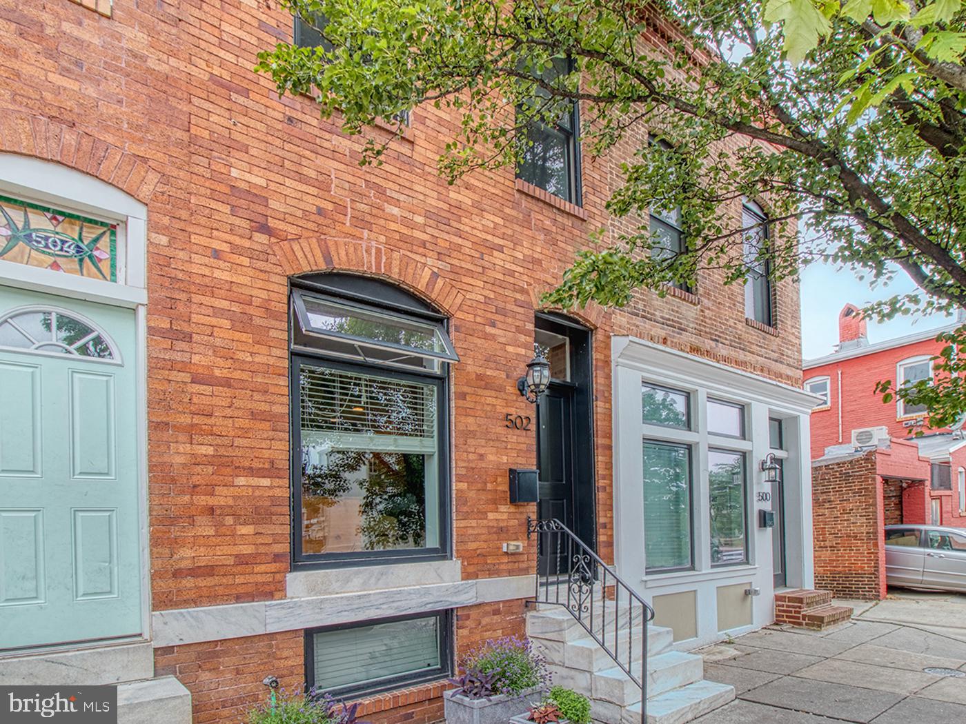 Mint condition Building Character renovation with 2 + years left on CHAP credit. 3 Bedrooms, 2 baths, with easy parking space out back and a generous roof deck (accessed from the hallway) perfect for social-distance entertaining on these summer evenings! Gorgeous hardwood floors throughout the 1st and 2nd floors. 2 nice sized bedrooms share a large hall bath with double sinks. Lovely detailing throughout includes window moldings, exposed brick, whole house sound system, recessed lighting, etc.  Wonderful kitchen with breakfast bar, stainless steel appliances, granite counters, and a very attractive tile backsplash. The lower level features a generous bedroom, a full bath, stacked front loading washer and dryer in a closet, and a wide hall with room for exercise equipment or storage. Check out the generous, easy access parking pad PLUS fenced patio in the rear! This home is literally 10 steps to Patterson Park (ok, maybe 20!) in arguably the best part of Canton- Walk to everything-fresh roasted coffee, incredible ice cream, terrific pizza, the supermarket, anything your heart desires!! Lakewood has diagonal parking and many lush street trees including one right in front of this home.