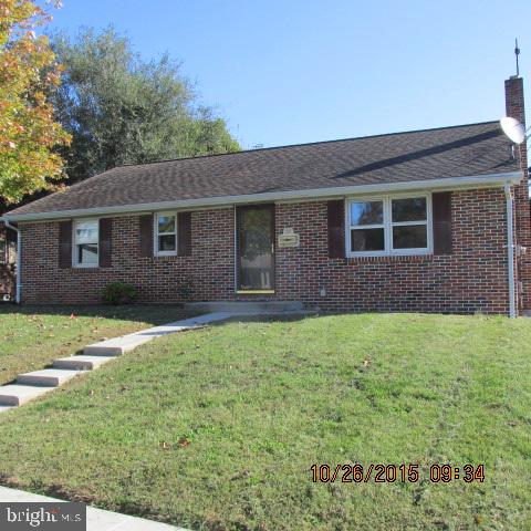 Brick rancher on nice lot. Enclosed back porch. Eat-in kitchen. Wood floors. Three bedrooms. Attic access. Full basement with outside entrance. Oversized one car brick detached garage. Replacement windows.