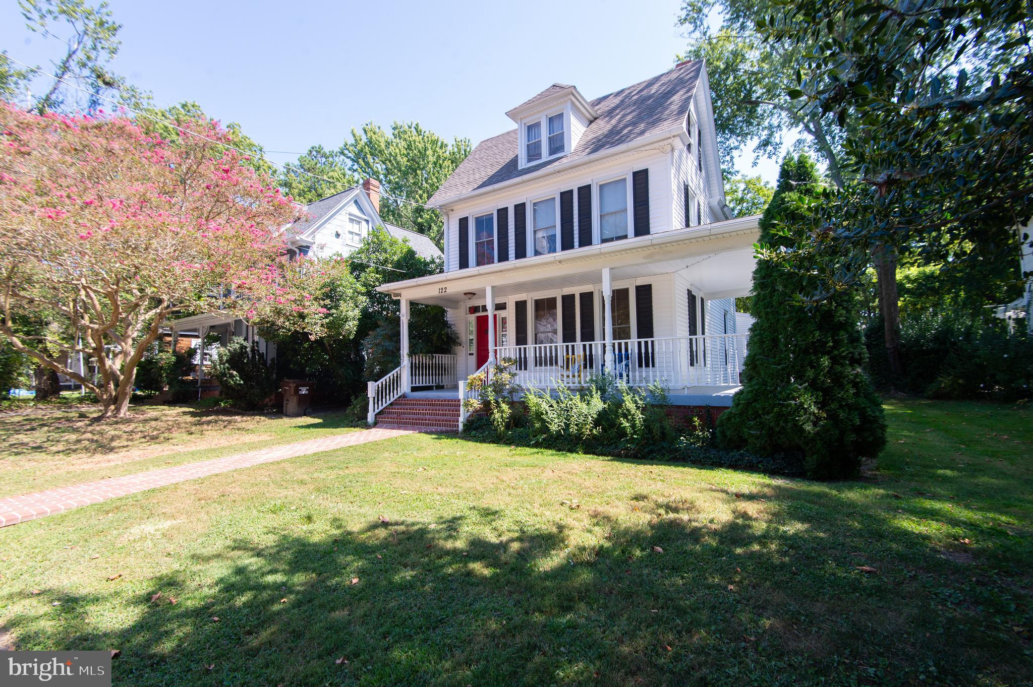 MAJOR PRICE REDUCTION!  Step into this Victorian 1900’s home ideally located in Historic District of Cambridge, just a few doors away from the Choptank River, Long Wharf and Municipal Yacht Basin.  Enjoy the convenience of being within walking distance to downtown galleries, restaurants, boutiques and dining. Come up the inviting brick walkway and brick steps to the charming wraparound porch perfect for entertaining or just relaxing in the breeze on a hot summer day.  Welcome inside to the spacious living room with built-in bookcases, wood floors and a  gas fireplace that has recently been serviced.  Separate dining room offers plenty of space for a large table for gatherings and a pantry for storage.  Eat-in kitchen has wood and laminate countertops with  double glass doors overlooking the back deck and yard.  Upstairs are three bedrooms and one full bathroom.  Newer carpet covers the stairway and one of the bedrooms.  Third level has room that could be used as an additional bedroom with adjacent huge attic area.  Situated on a generous size lot, the back yard is great for a flower garden and the large deck is perfect for cook-outs.  Also has a shed and fence across the back for privacy.  Private off-street driveway.  
Victorian charm and character adorns this home.  Come take a look at this timeless beauty.